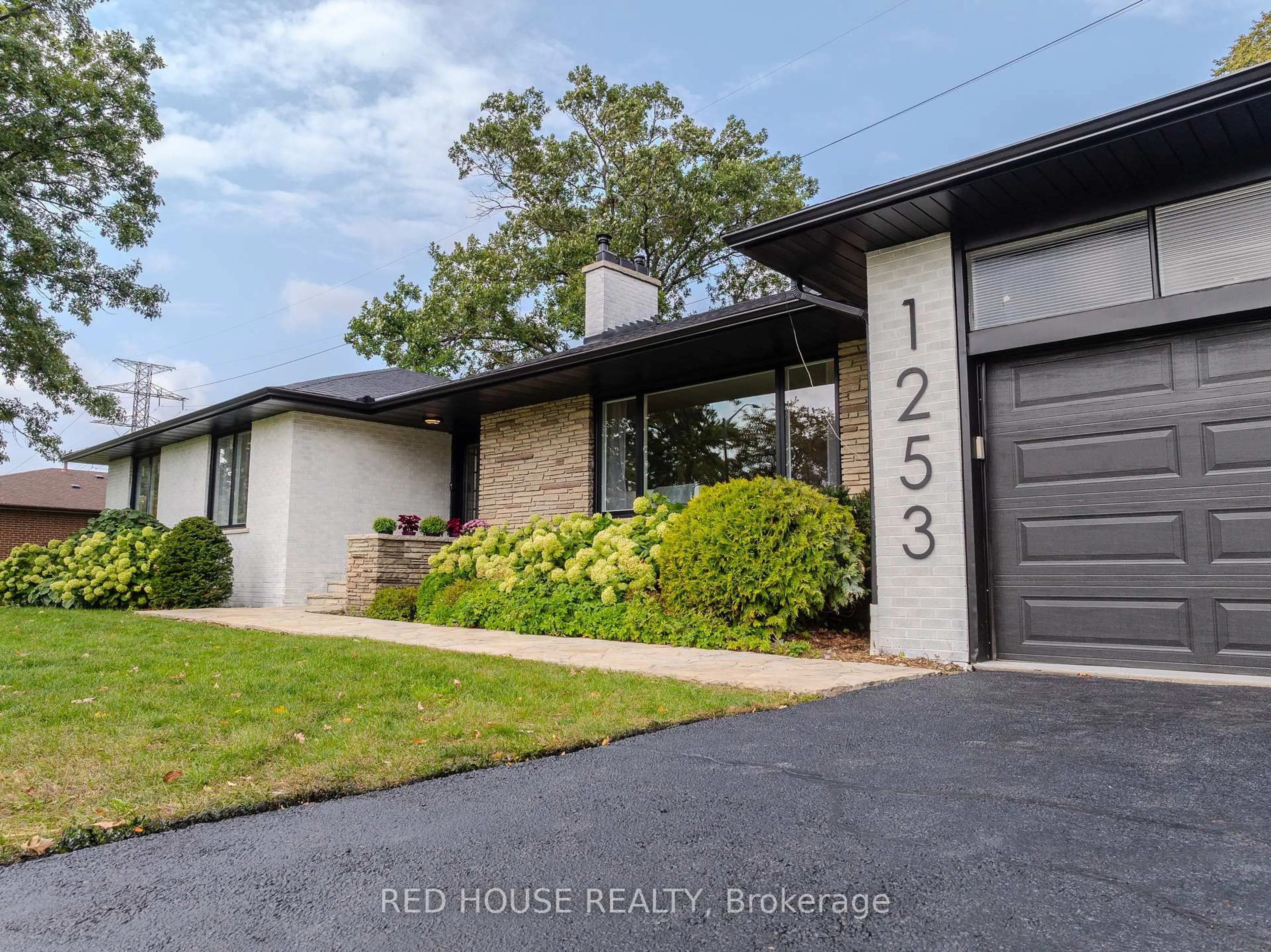 Home with brick exterior material, street for 1253 Melton Dr, Mississauga Ontario L4Y 1L6