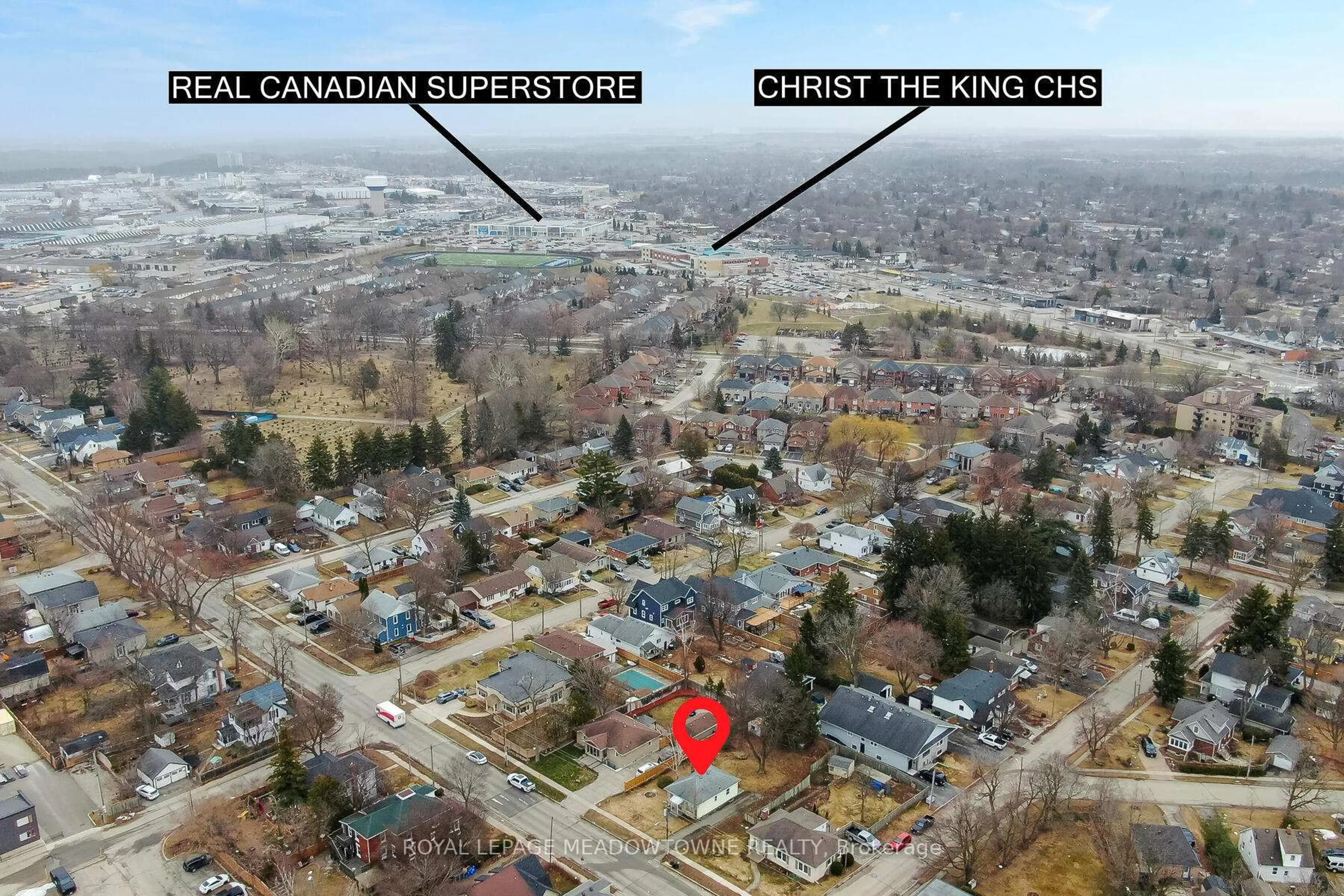 A pic from outside/outdoor area/front of a property/back of a property/a pic from drone, unknown for 48 King St, Halton Hills Ontario L7G 2G4