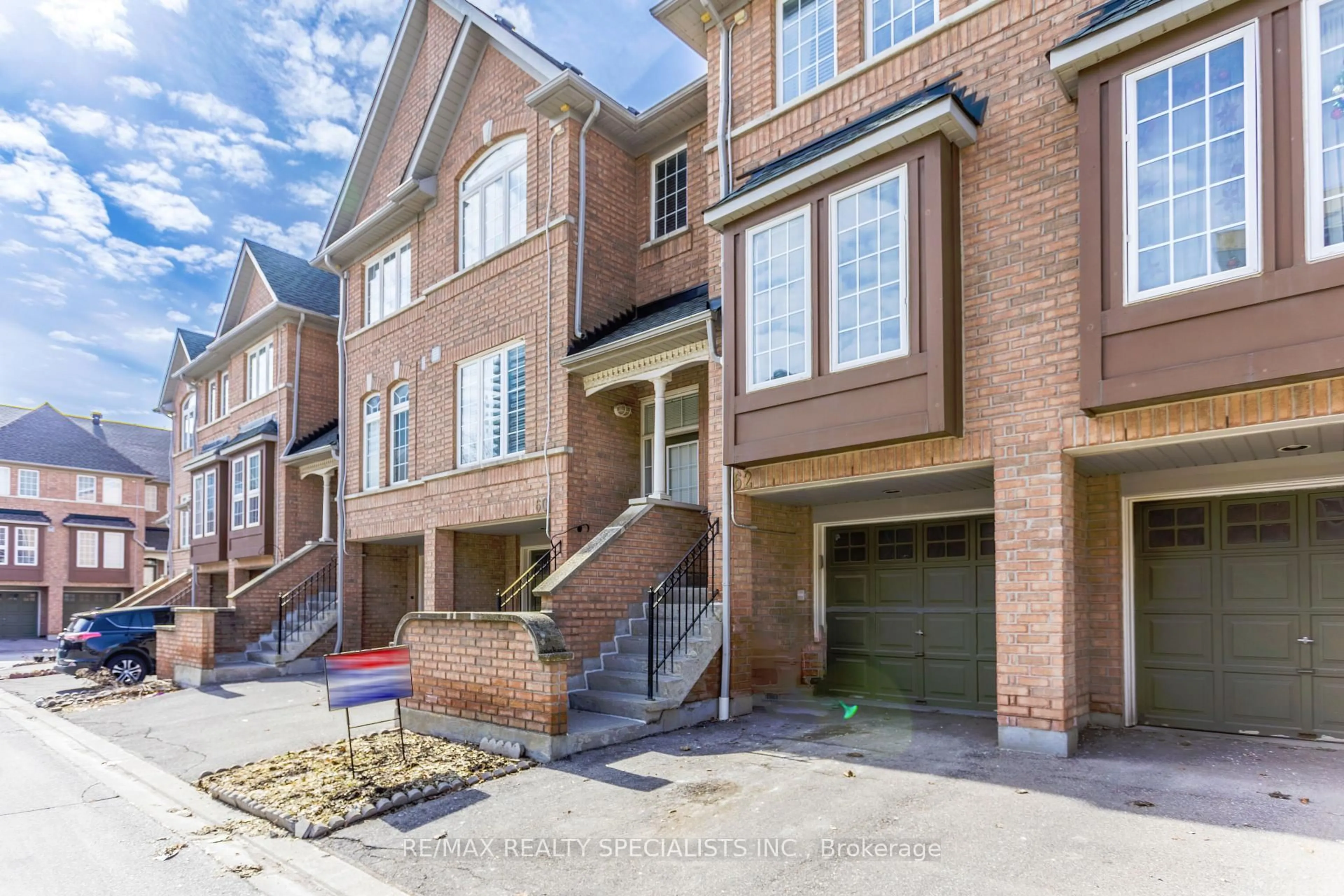 Home with brick exterior material, street for 50 Strathaven Dr #62, Mississauga Ontario L5R 4E7