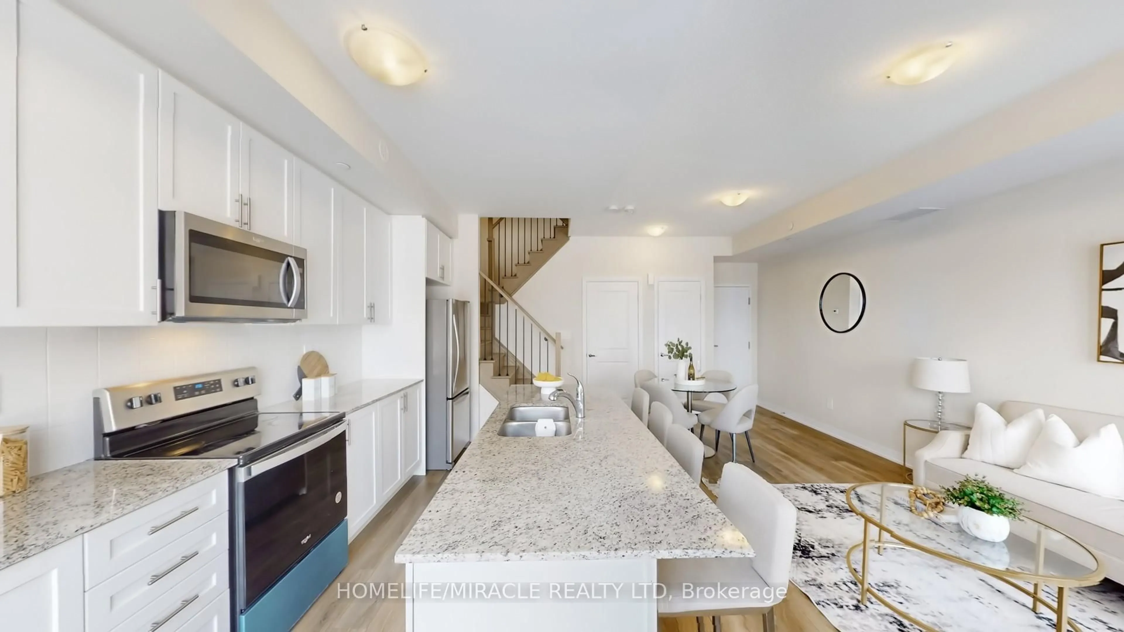 Open concept kitchen, ceramic/tile floor for 1577 Rose Way #416, Milton Ontario L9E 1N4