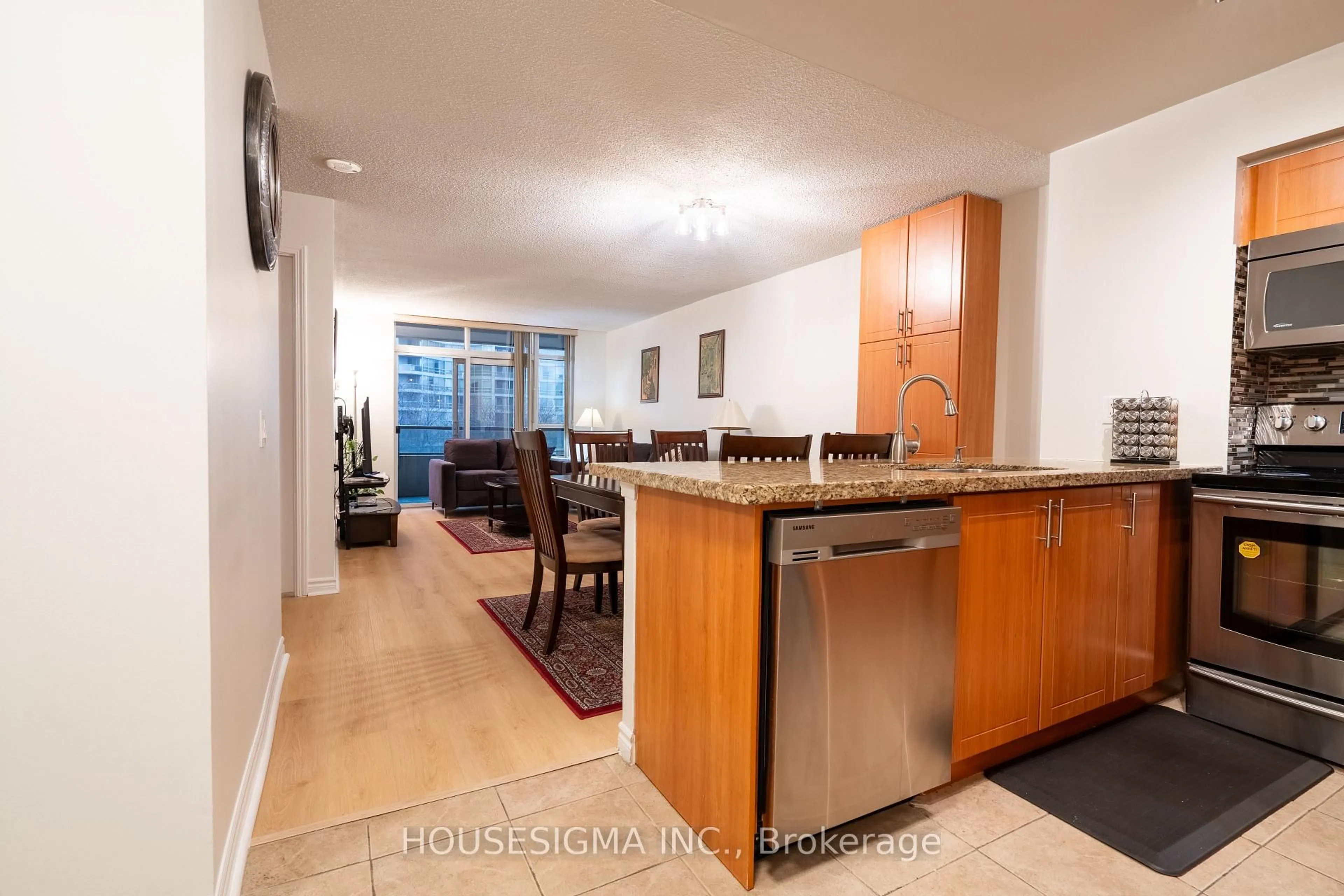 Open concept kitchen, unknown for 35 Kingsbridge Garden Circ #513, Mississauga Ontario L5R 3Z5