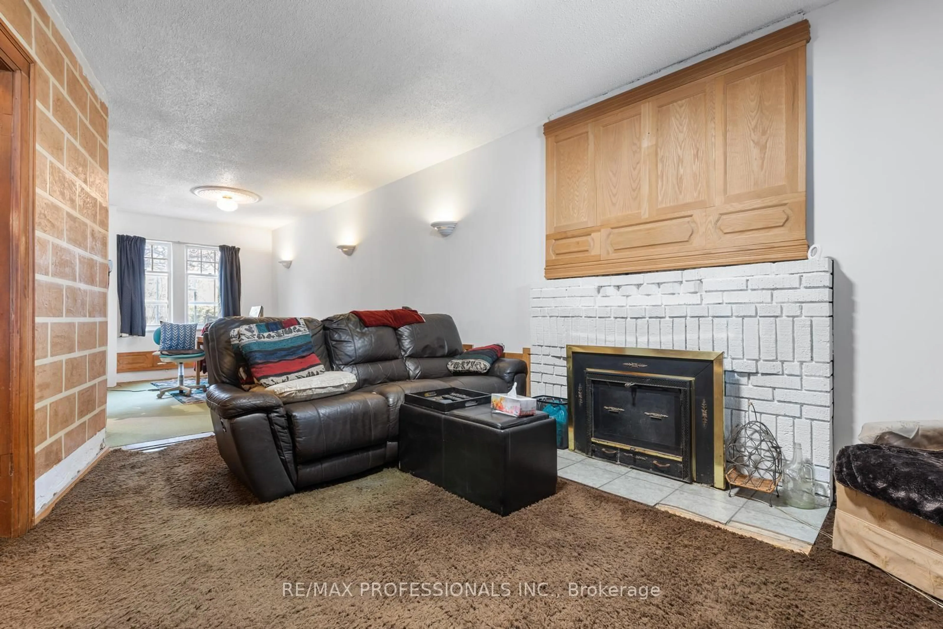 Living room with furniture, unknown for 857 Windermere Ave, Toronto Ontario M6S 3M5