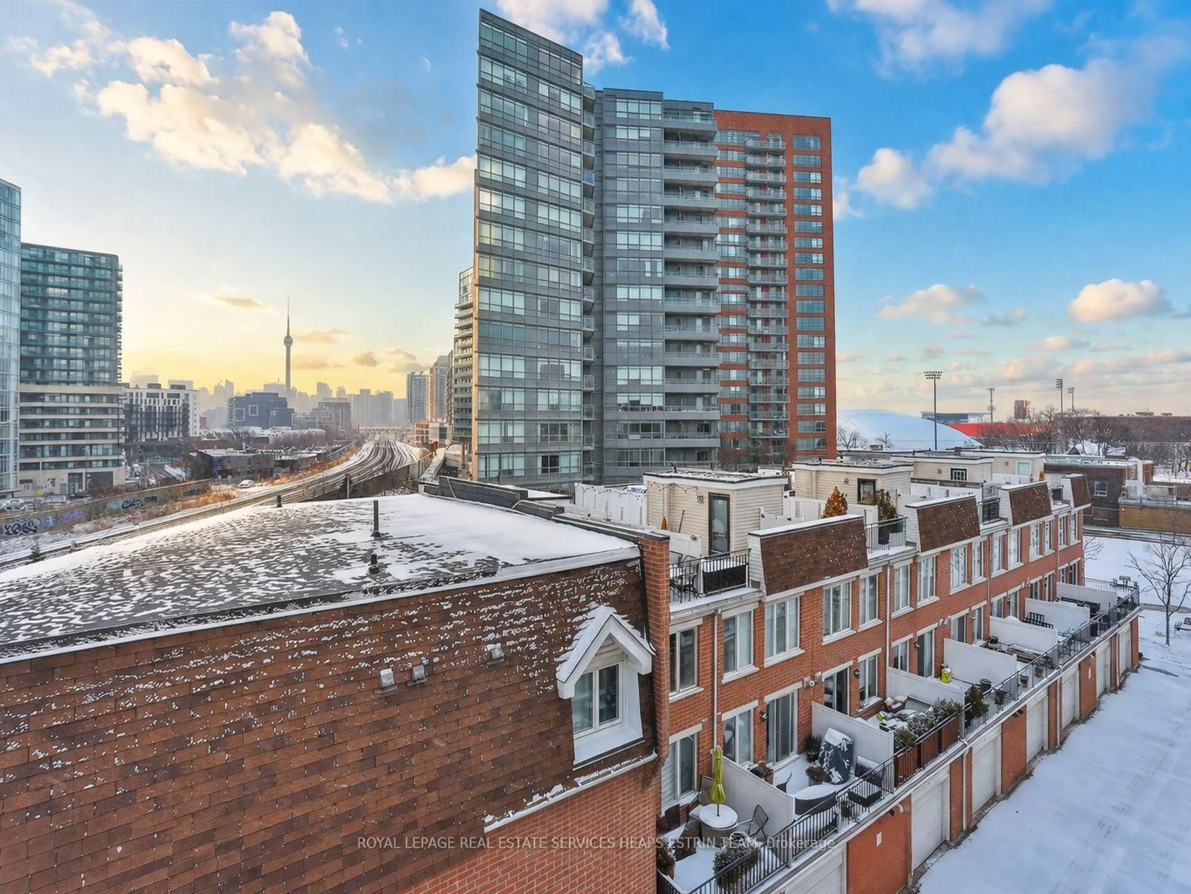 A pic from outside/outdoor area/front of a property/back of a property/a pic from drone, city buildings view from balcony for 50 Joe Shuster Way #215, Toronto Ontario M6K 1Y8