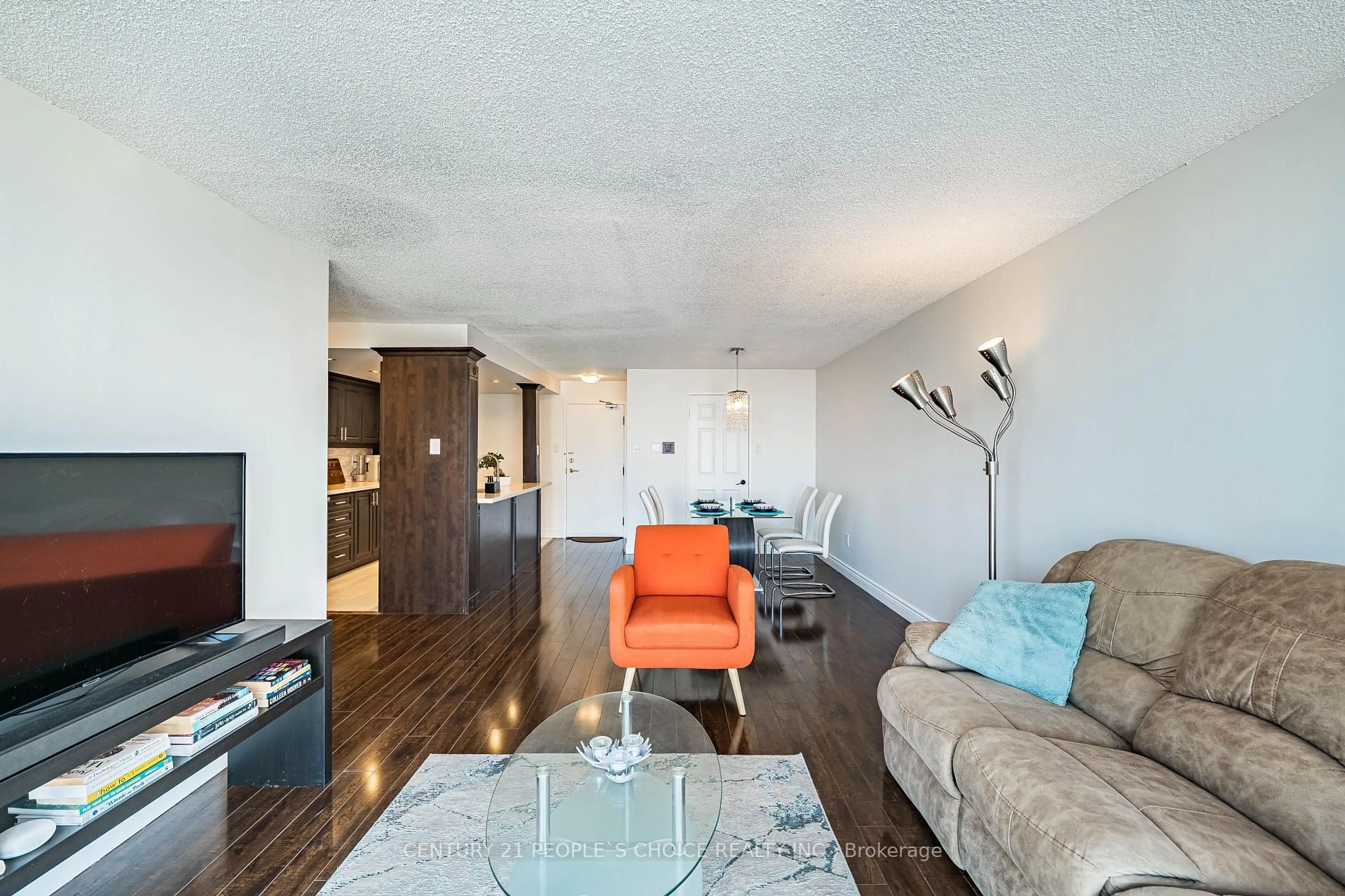 Living room with furniture, wood/laminate floor for 4205 Shipp Dr #1805, Mississauga Ontario L4Z 2Y9