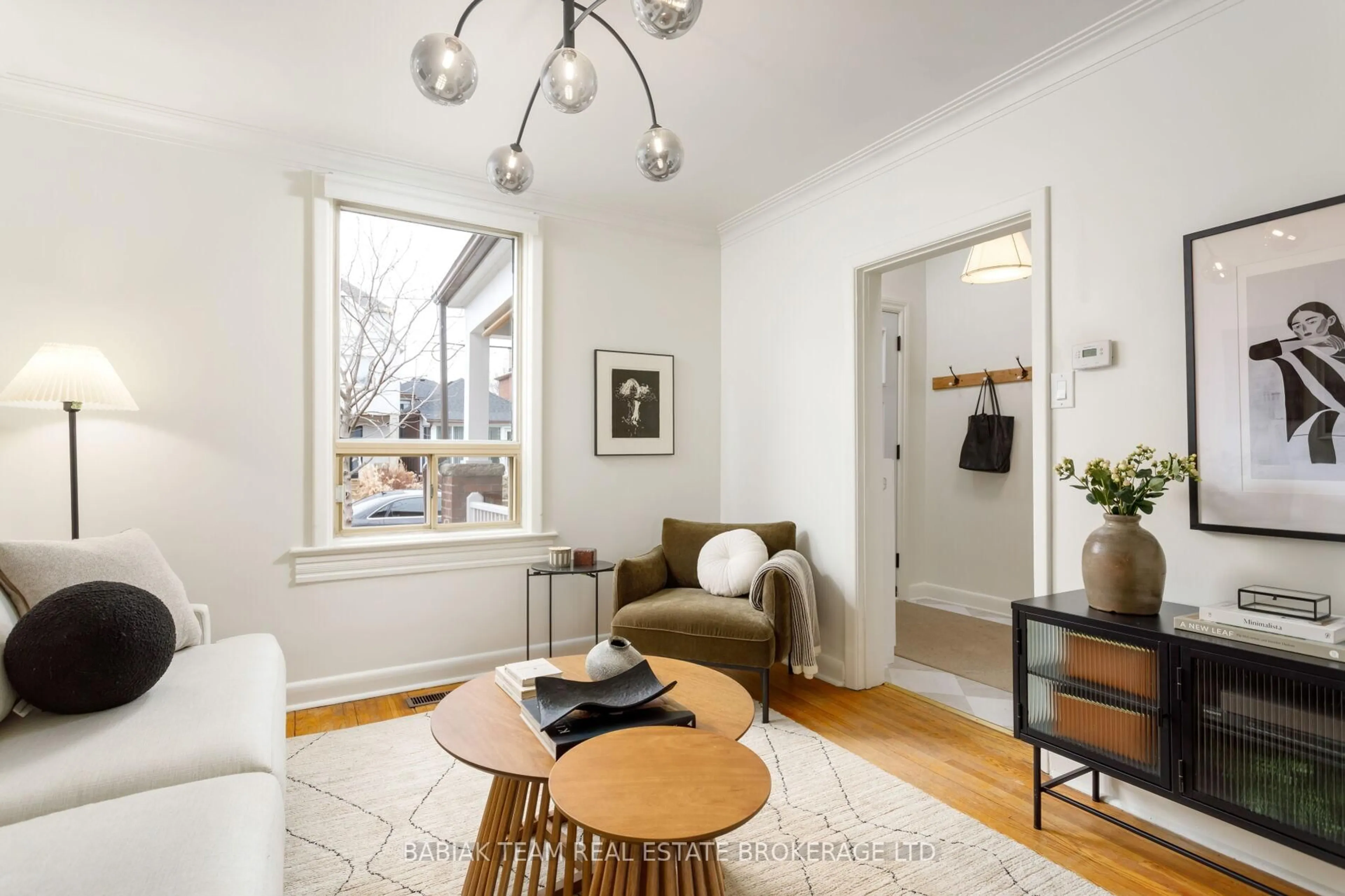 Living room with furniture, wood/laminate floor for 45 Montye Ave, Toronto Ontario M6S 2G8