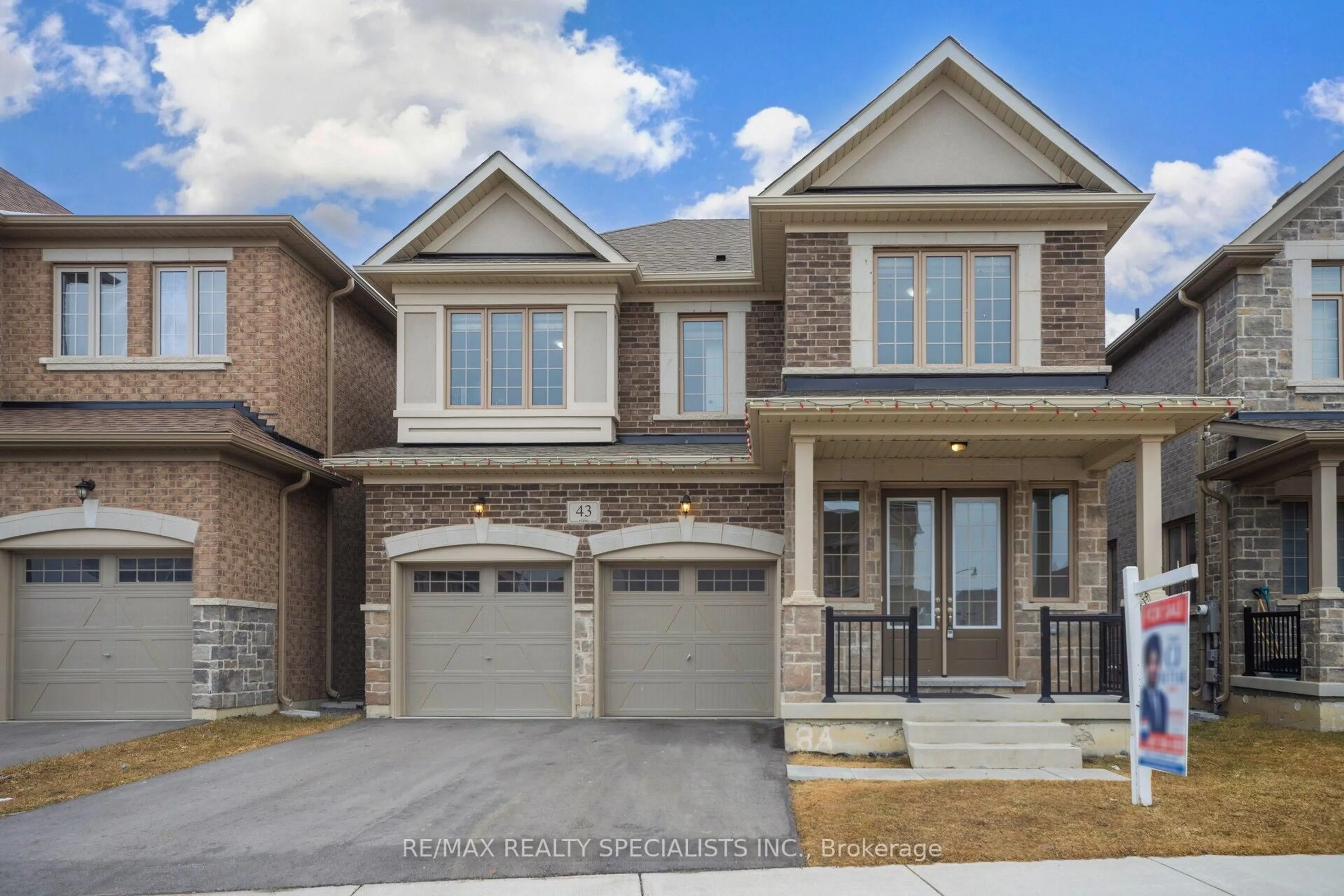 Home with brick exterior material, street for 43 Clockwork Dr, Brampton Ontario L7A 4R8