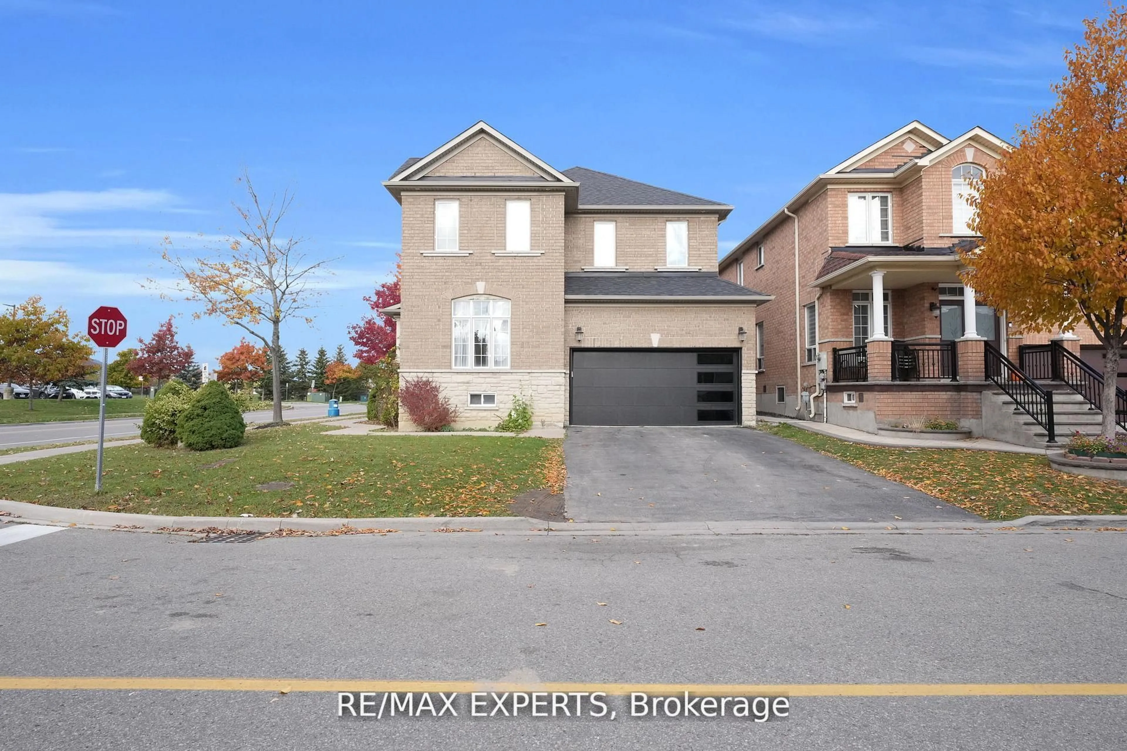 Home with brick exterior material, street for 261 Mountainash Rd, Brampton Ontario L6R 3M3
