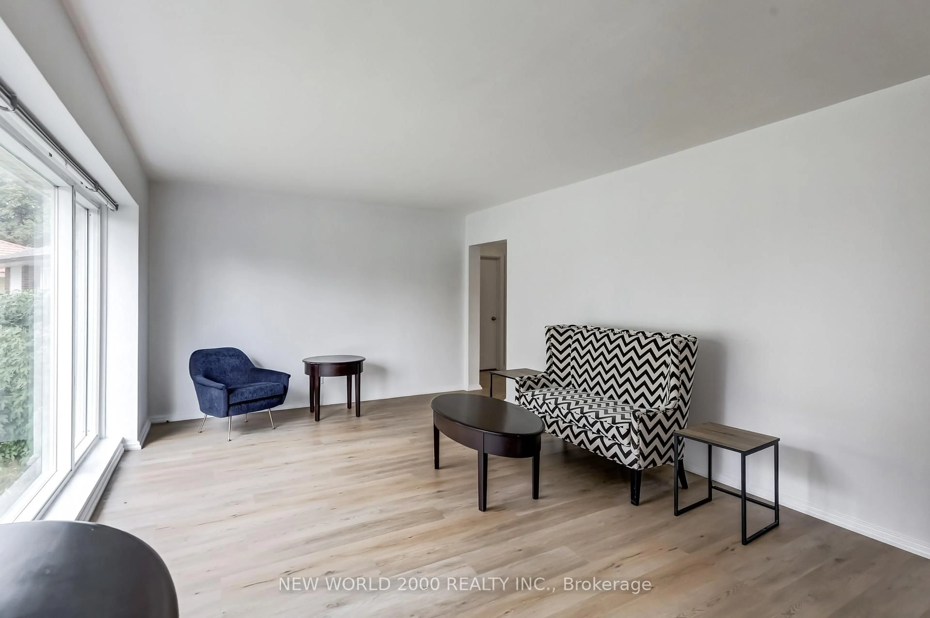 Living room with furniture, wood/laminate floor for 21 Restever Gate, Toronto Ontario M9W 4B8