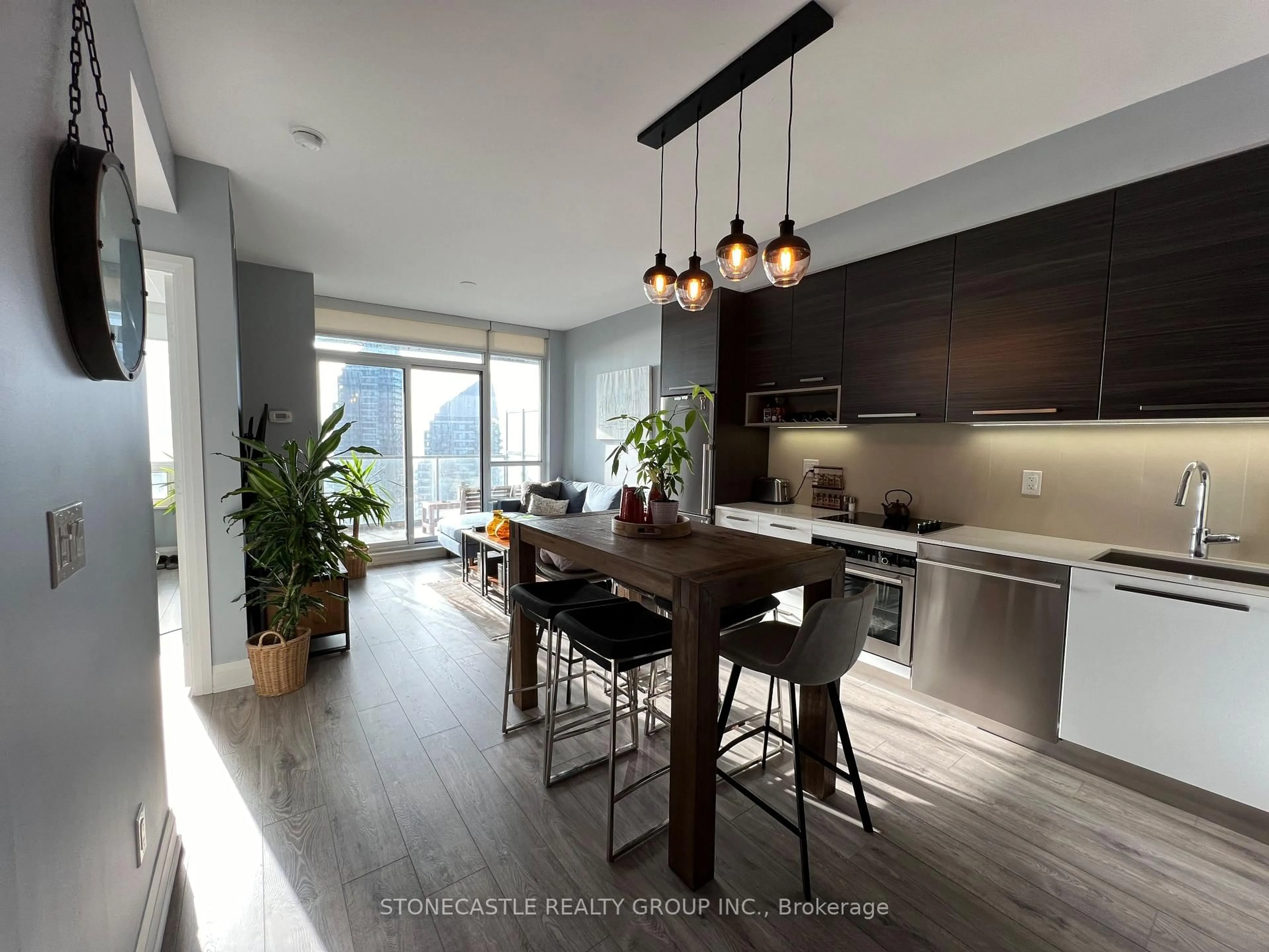Open concept kitchen, wood/laminate floor for 36 Park Lawn Rd #2401, Toronto Ontario M8V 0E5