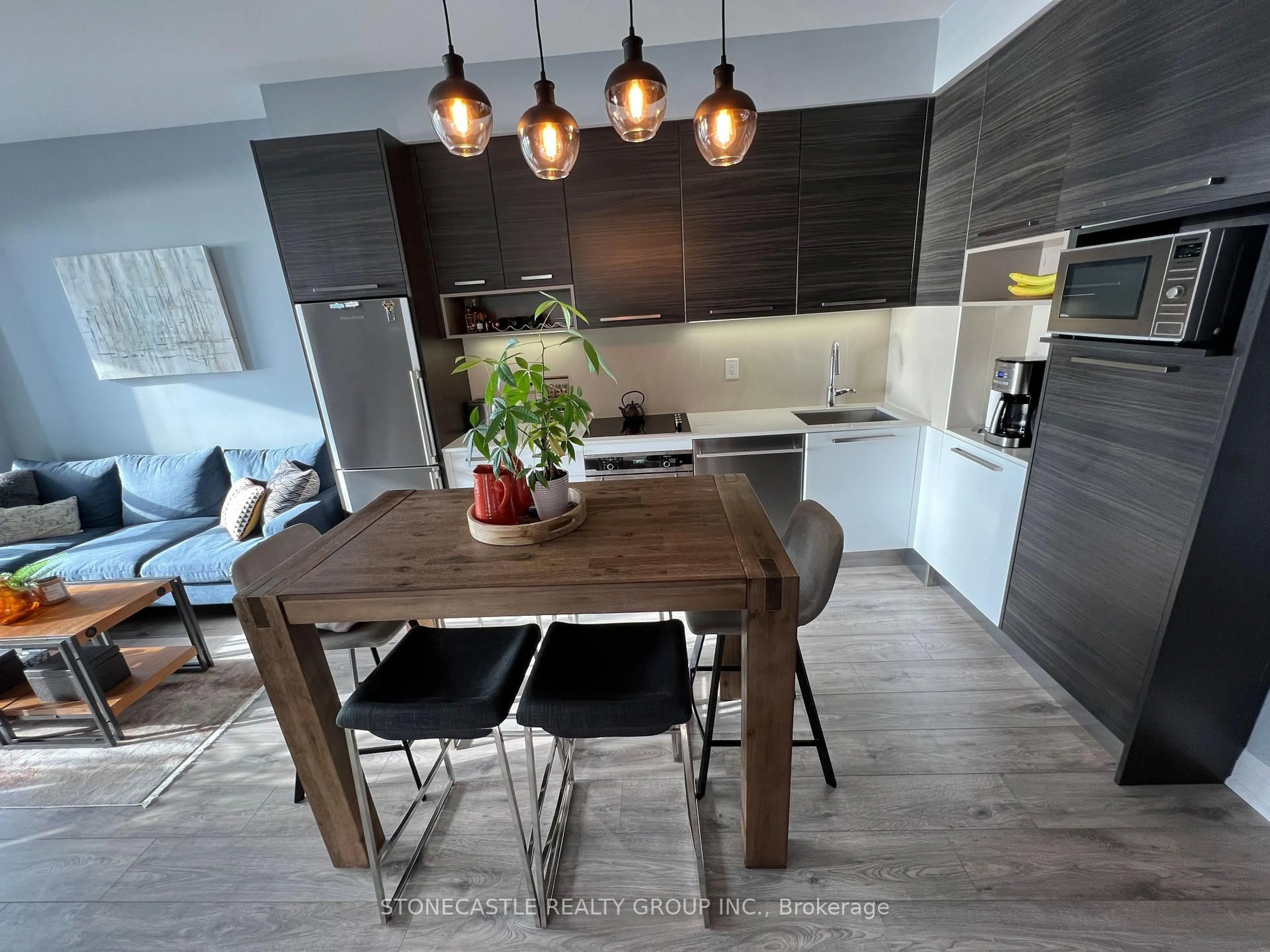 Contemporary kitchen, wood/laminate floor for 36 Park Lawn Rd #2401, Toronto Ontario M8V 0E5