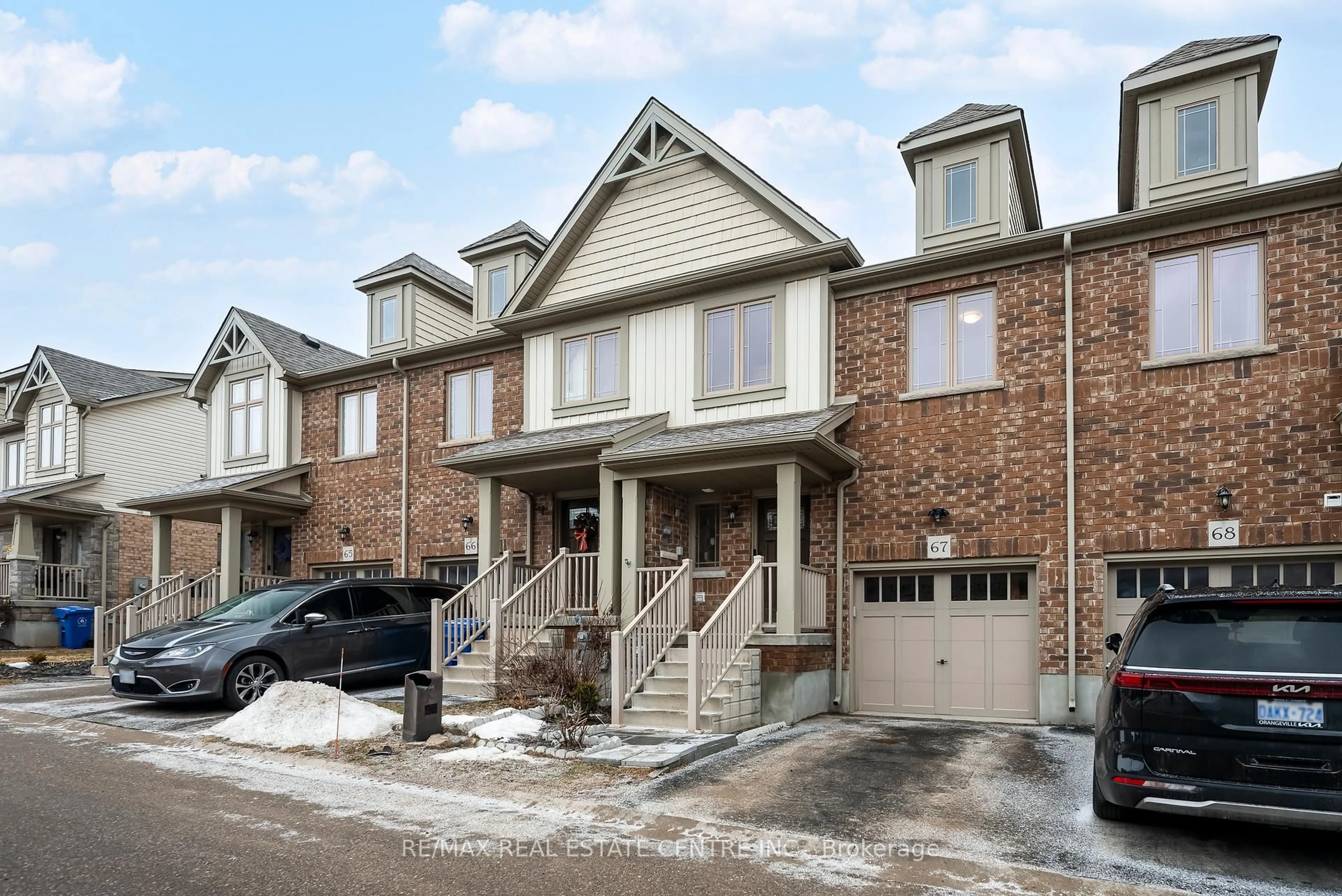 Home with brick exterior material, street for 124 Parkinson Cres #67, Orangeville Ontario L9W 6R7