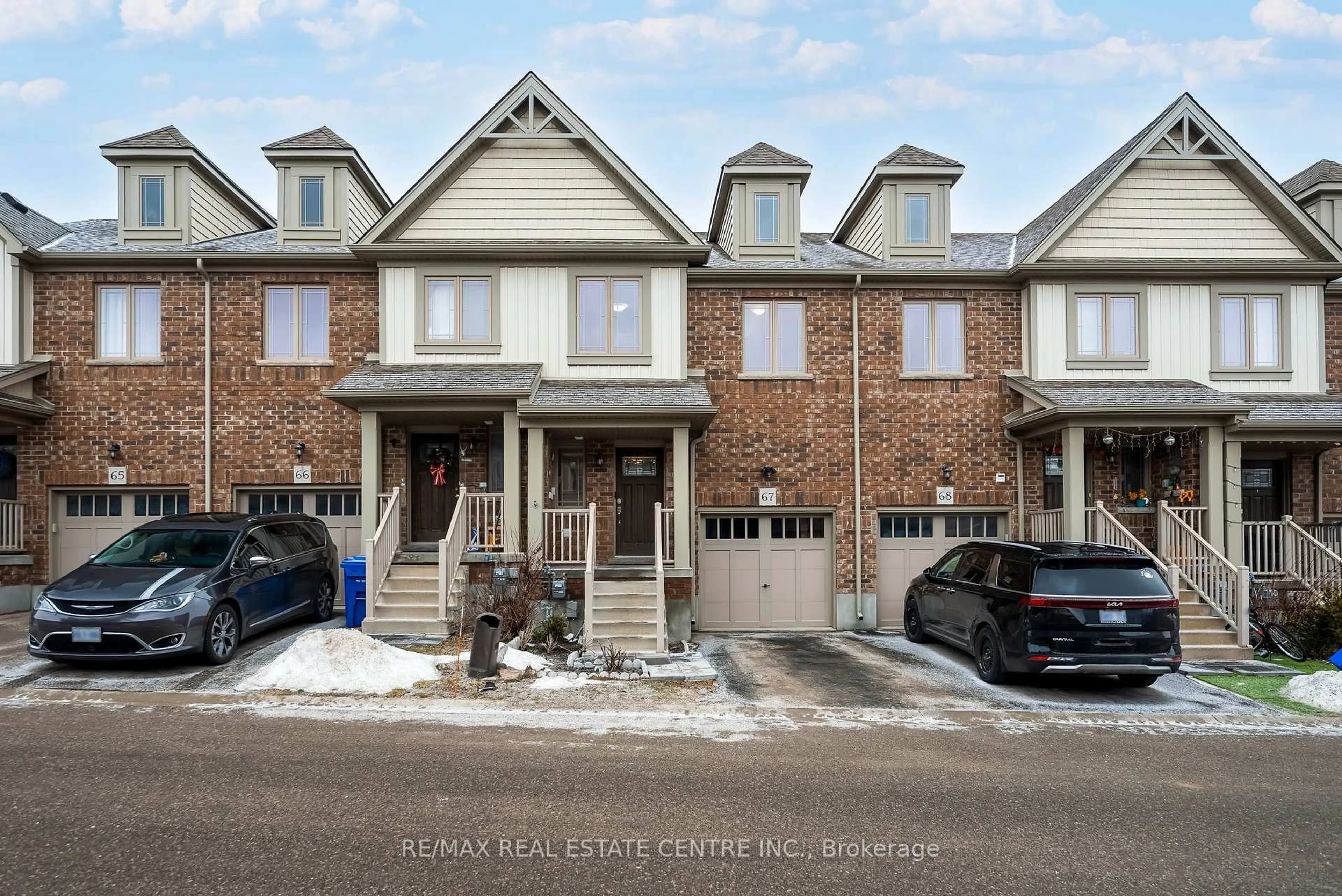 Home with brick exterior material, street for 124 Parkinson Cres #67, Orangeville Ontario L9W 6R7