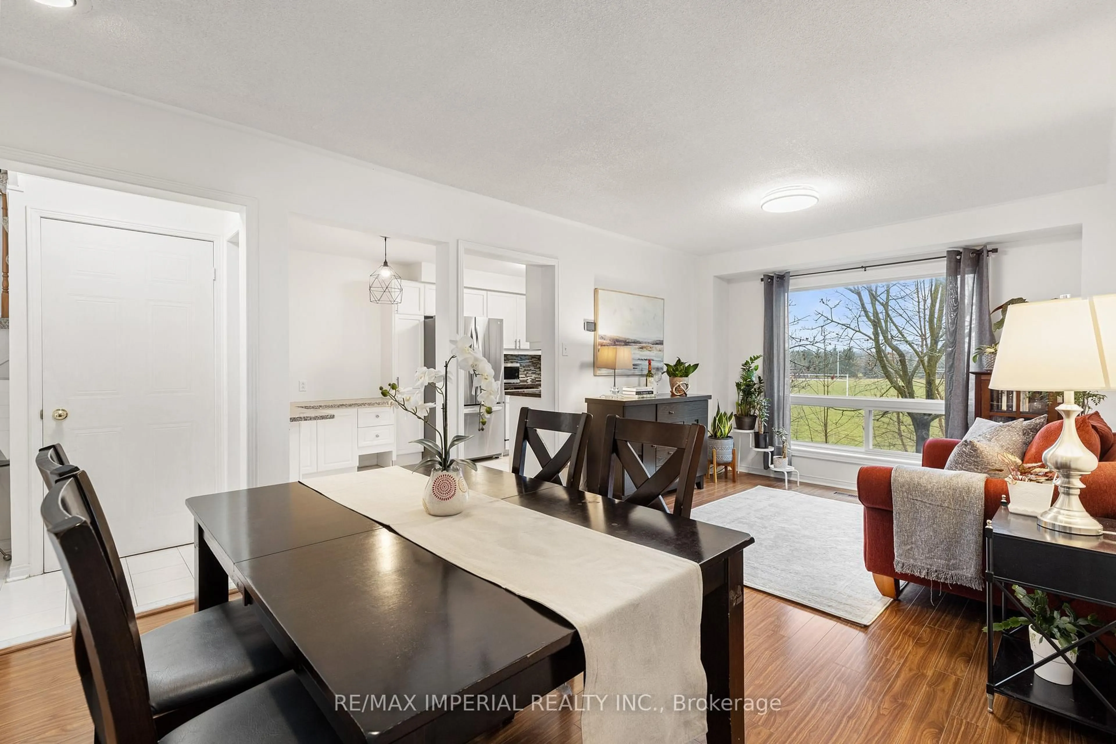 Open concept kitchen, wood/laminate floor for 5305 Glen Erin Dr #37B, Mississauga Ontario L5M 5N7