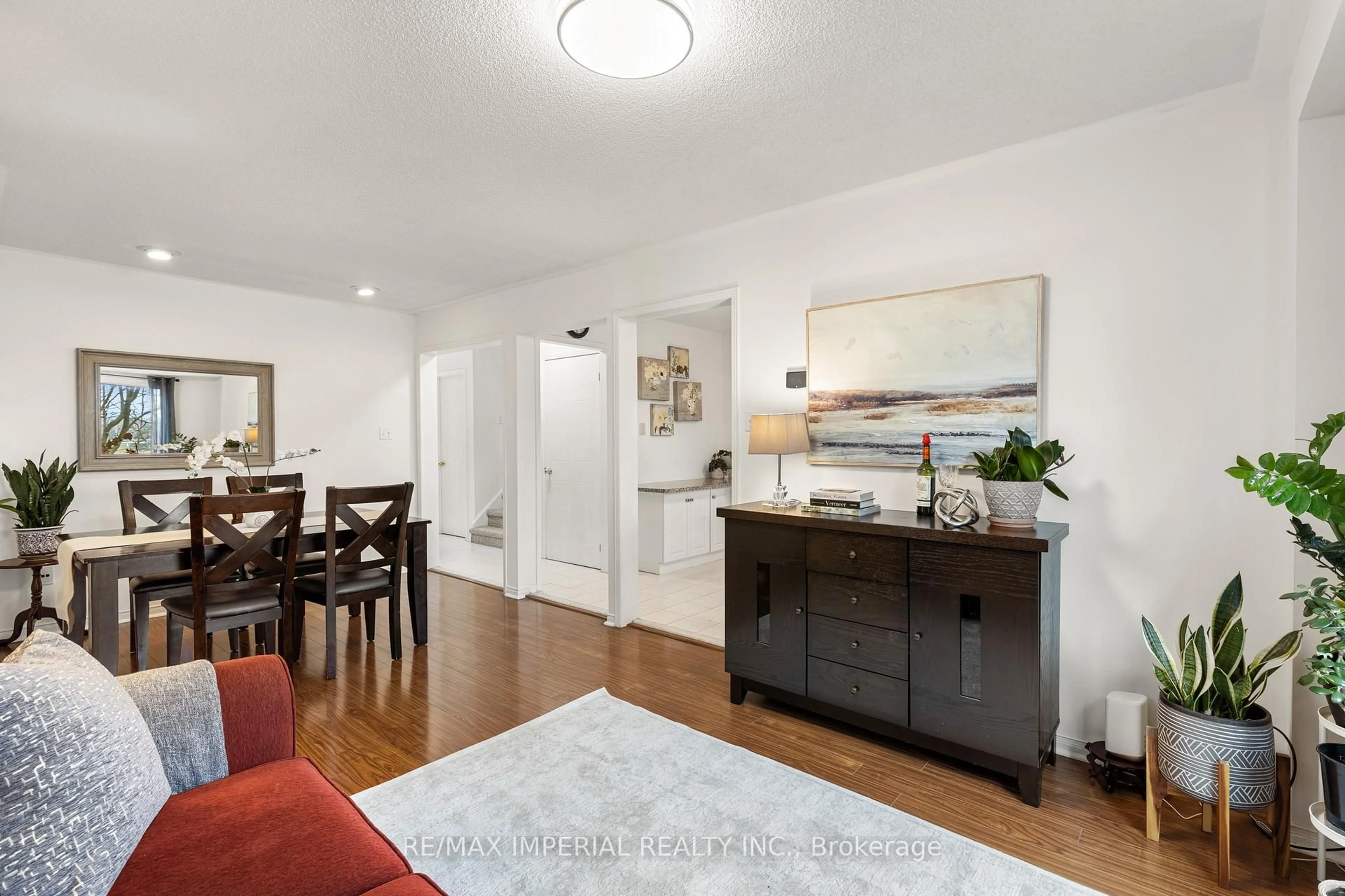 Living room with furniture, wood/laminate floor for 5305 Glen Erin Dr #37B, Mississauga Ontario L5M 5N7