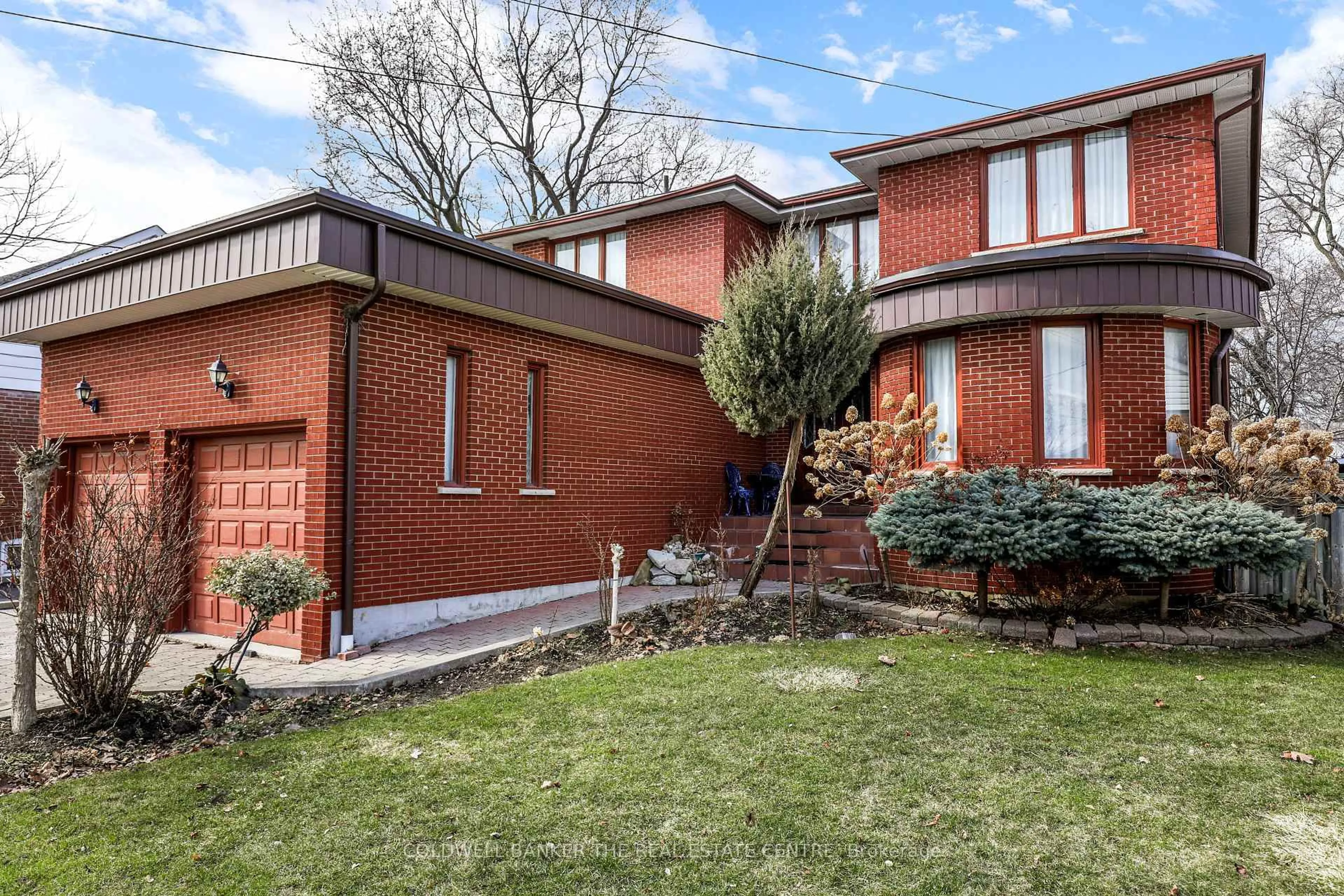Home with brick exterior material, street for 36 Ovida Ave, Toronto Ontario M9B 1E1