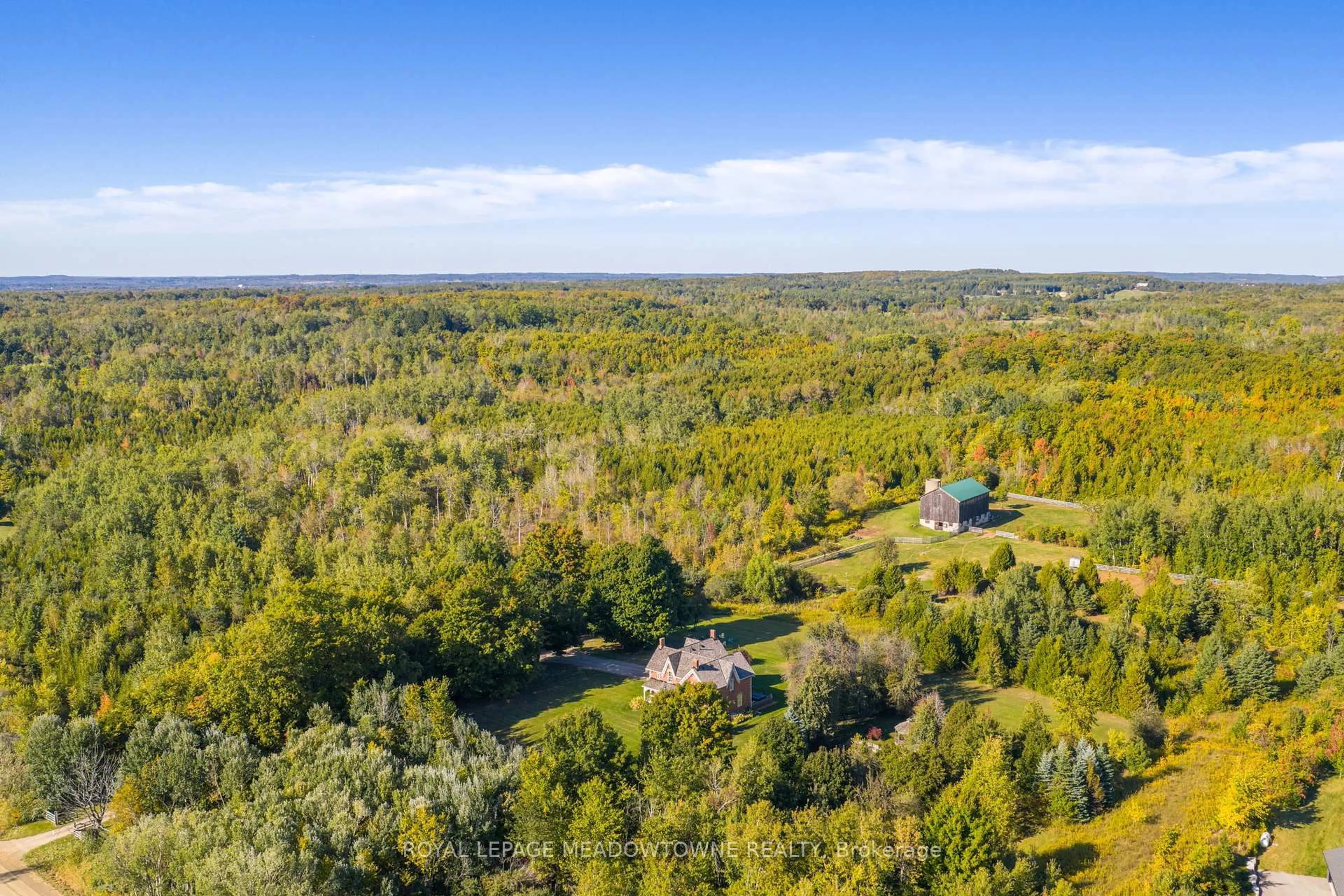 A pic from outside/outdoor area/front of a property/back of a property/a pic from drone, forest/trees view for 16089 Shaws Creek Rd, Caledon Ontario L7C 1V9