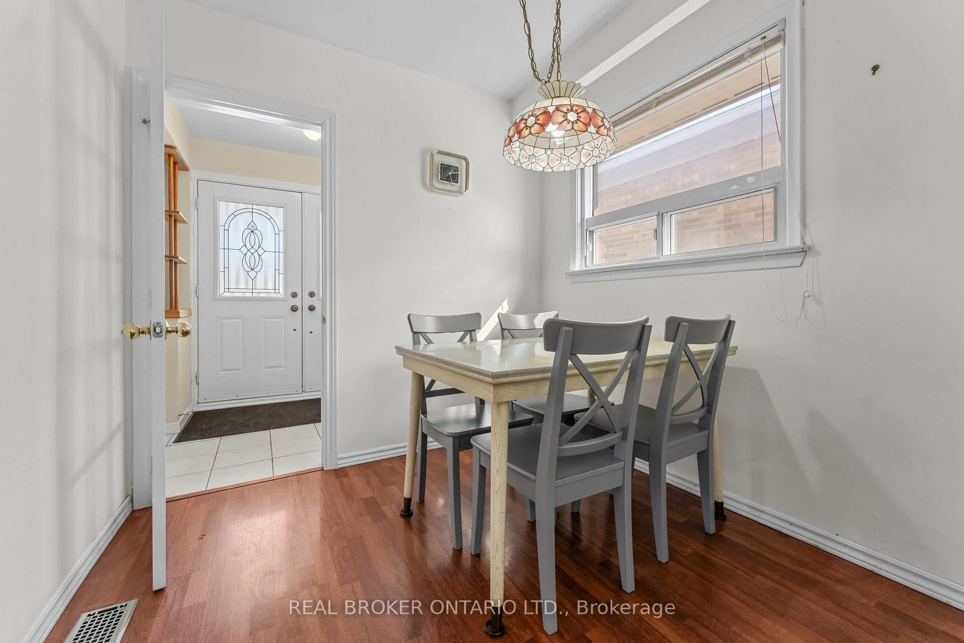 Dining room, wood/laminate floor for 23 Beaumaris Cres, Toronto Ontario M9R 1N7