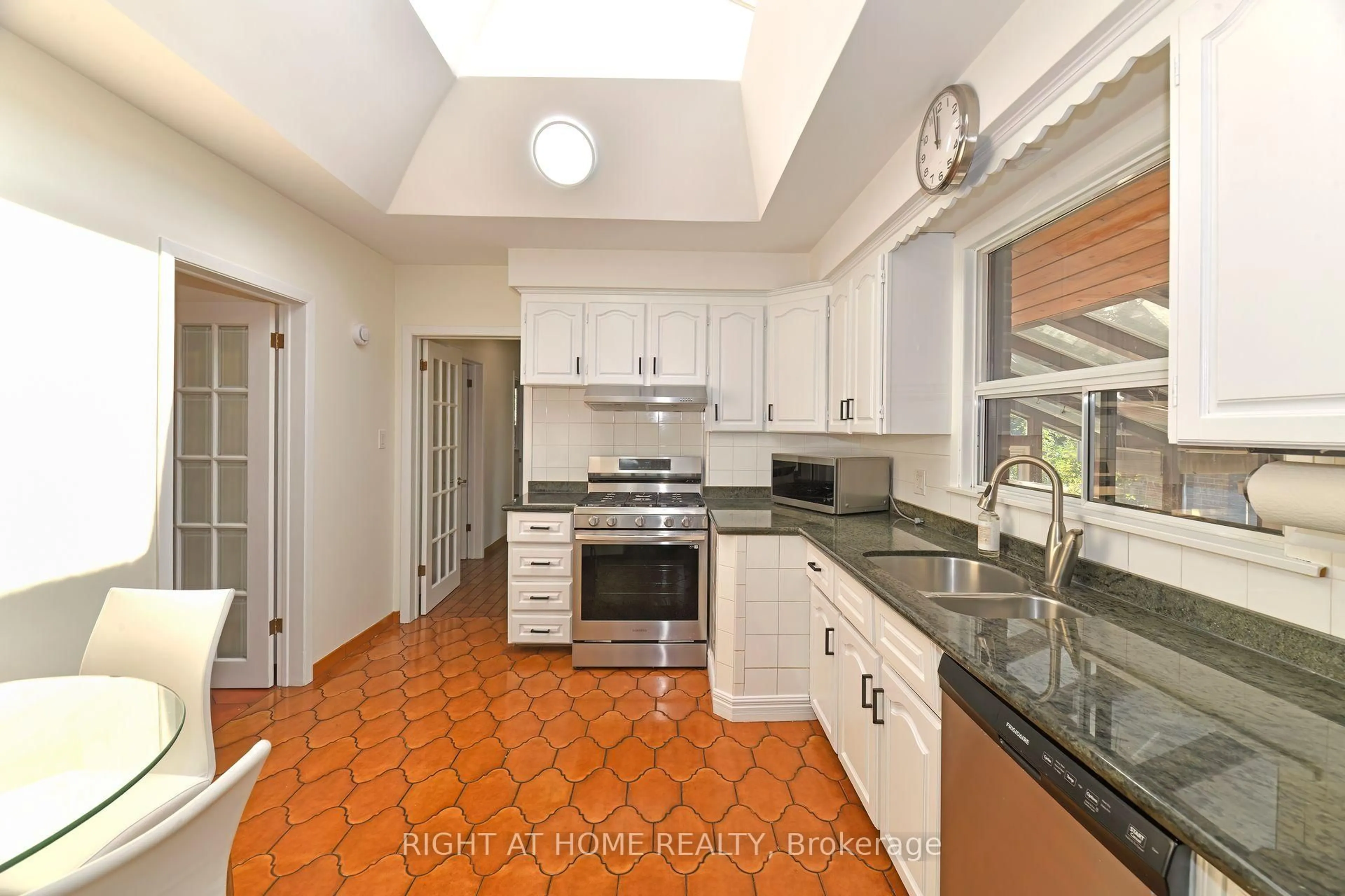 Open concept kitchen, ceramic/tile floor for 1033 Islington Ave, Toronto Ontario M8Z 4R3