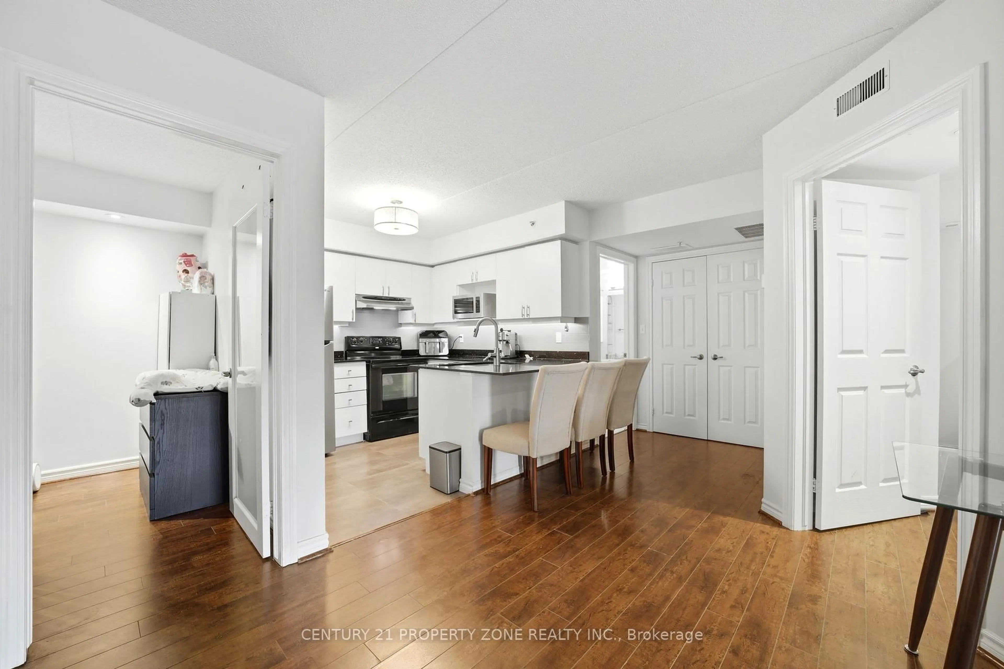 Open concept kitchen, unknown for 306 - 1440 Bishops Gate, Oakville Ontario L6M 4M9