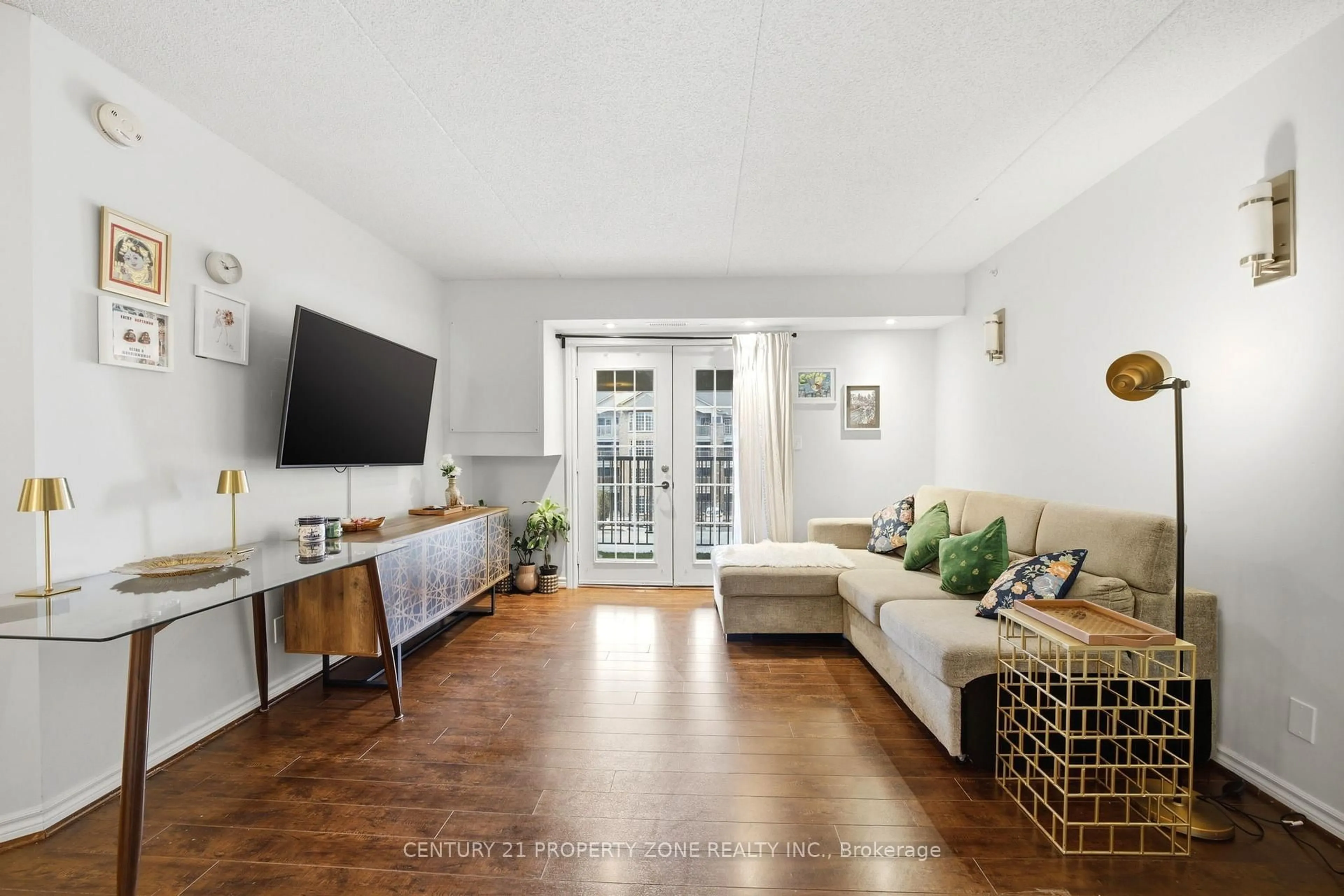 Living room with furniture, unknown for 306 - 1440 Bishops Gate, Oakville Ontario L6M 4M9