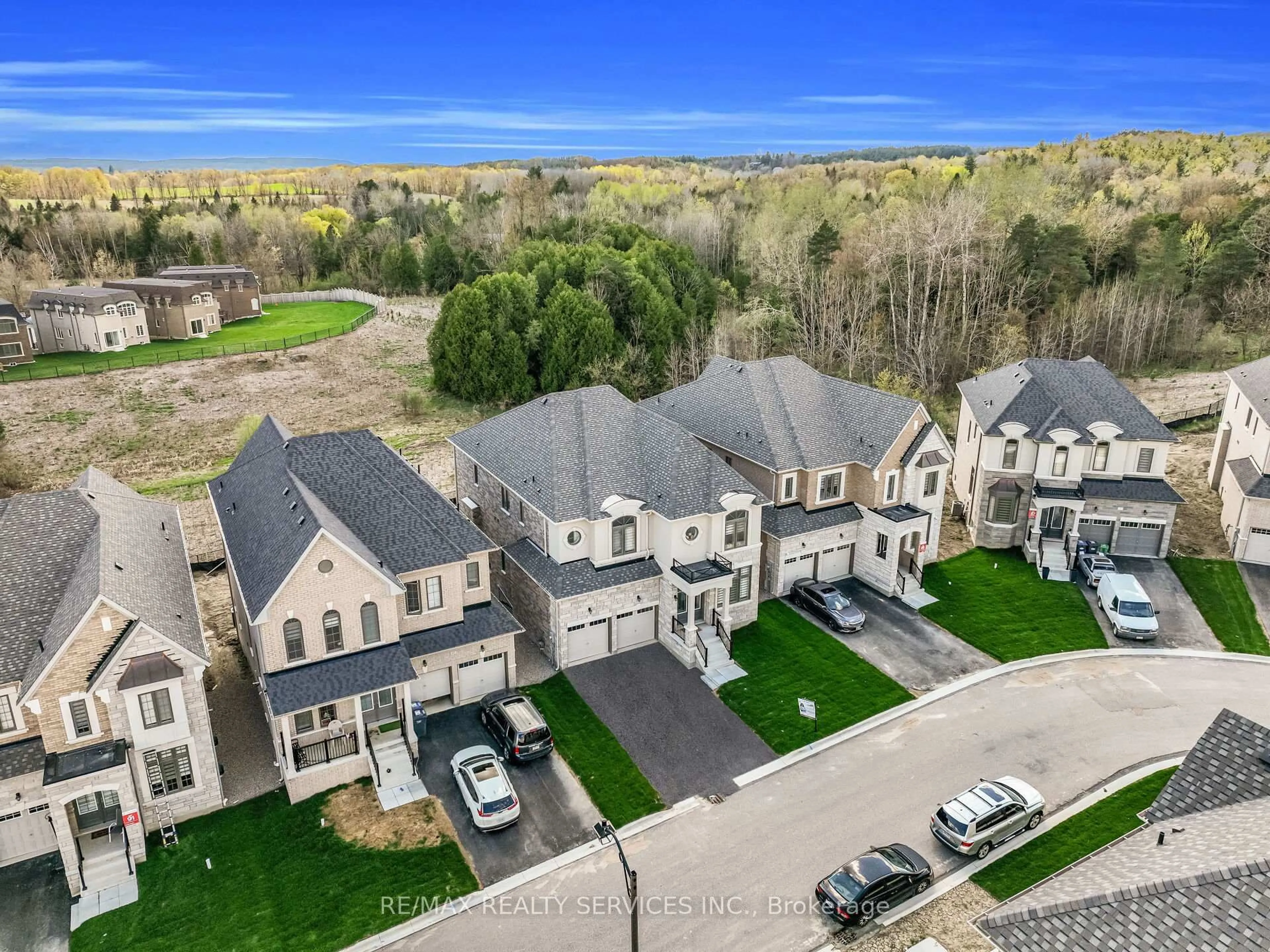 A pic from outside/outdoor area/front of a property/back of a property/a pic from drone, mountain view for 67 James Walker Ave, Caledon Ontario L7C 4M8