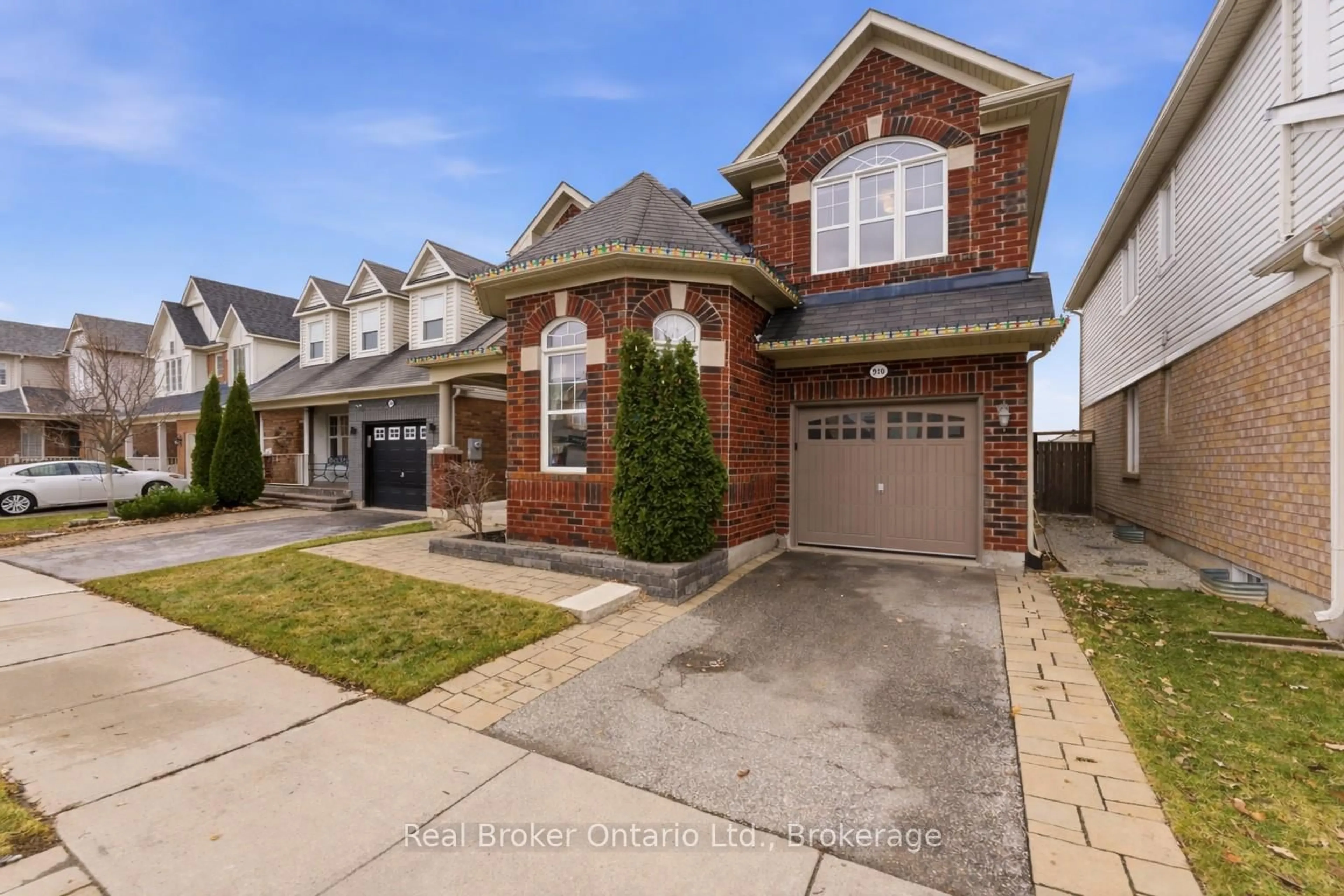 Home with brick exterior material, street for 910 Vickerman Way, Milton Ontario L9T 0K5