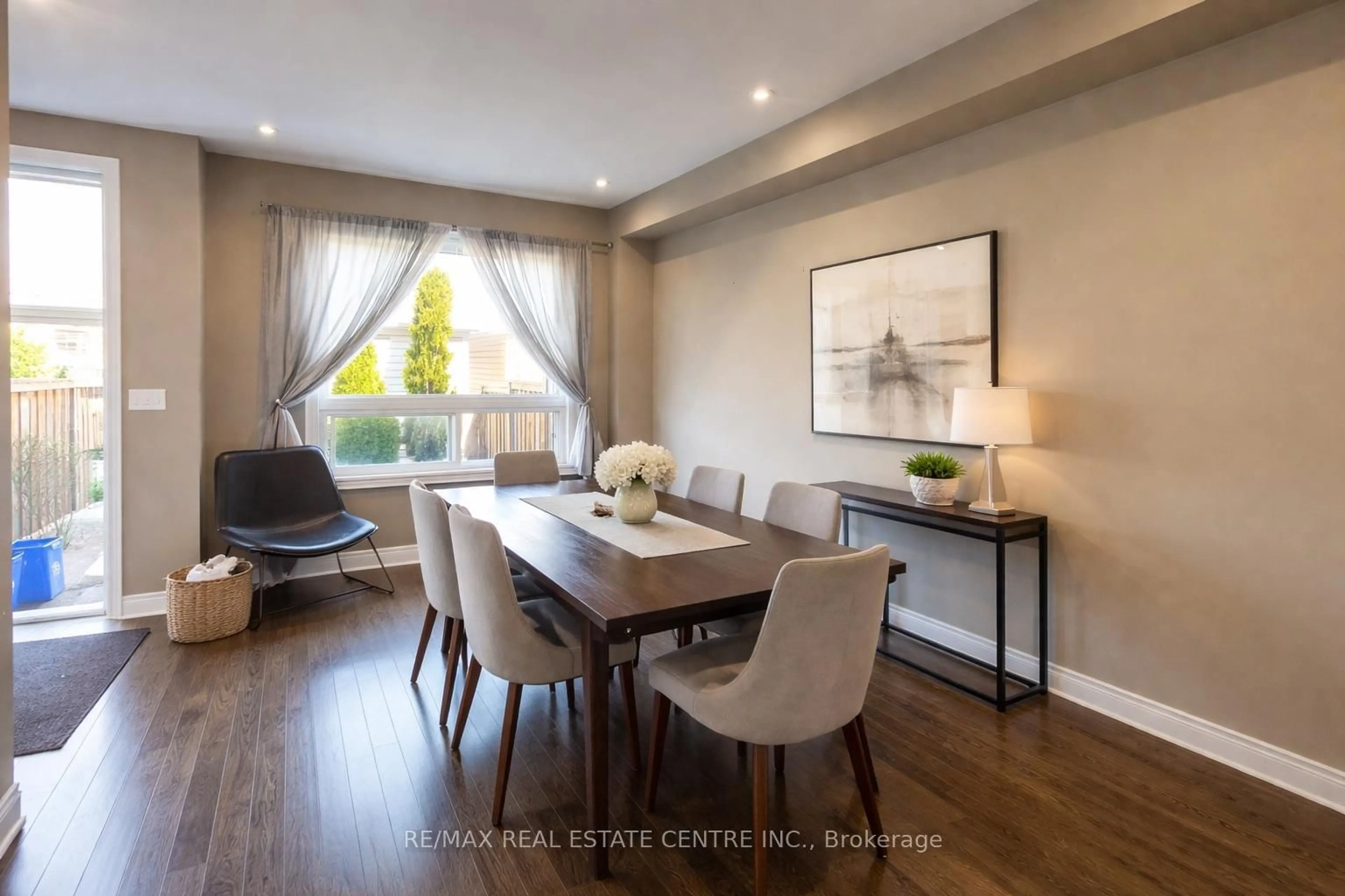 Dining room, wood/laminate floor for 2491 Postmaster Dr, Oakville Ontario L6M 0L5