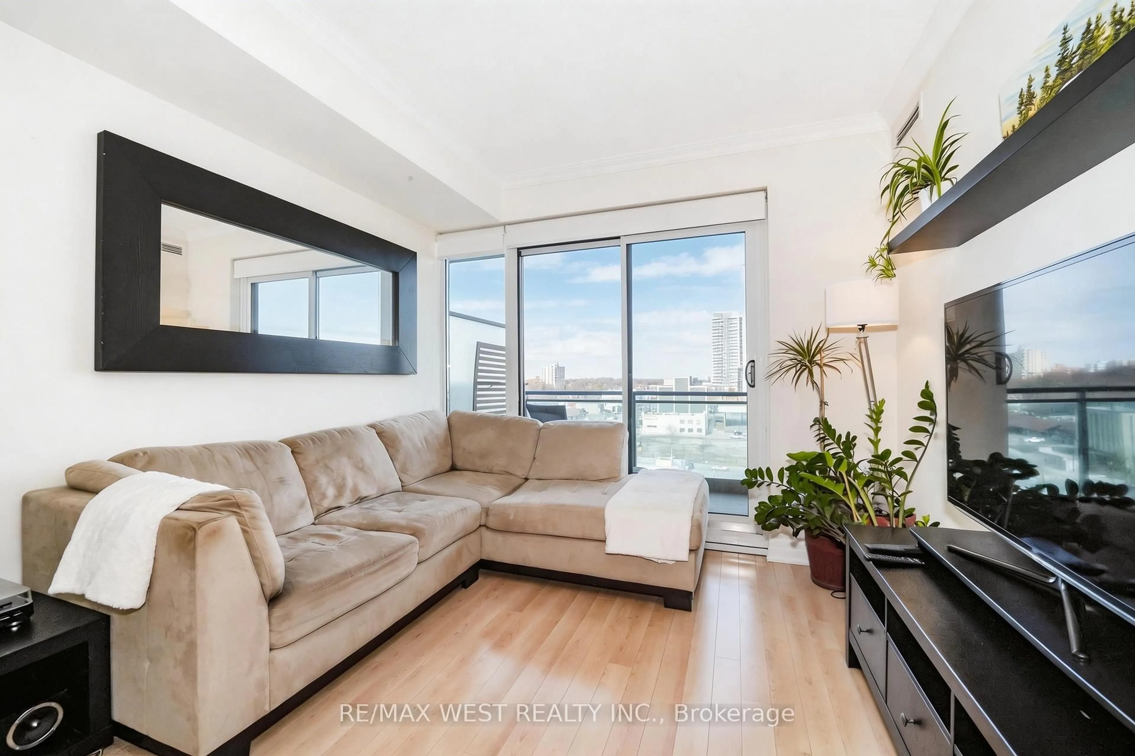 Living room with furniture, unknown for 100 John St #909, Brampton Ontario L6W 0A8