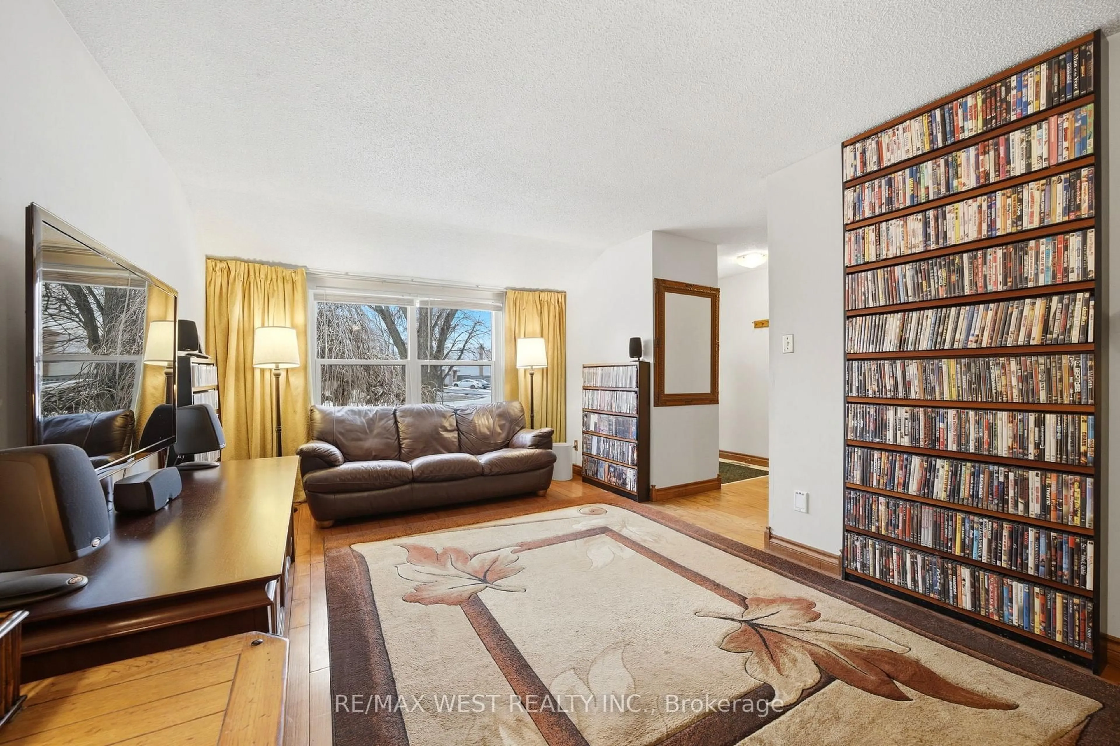 Living room with furniture, unknown for 60 Majestic Cres, Brampton Ontario L6S 3N2