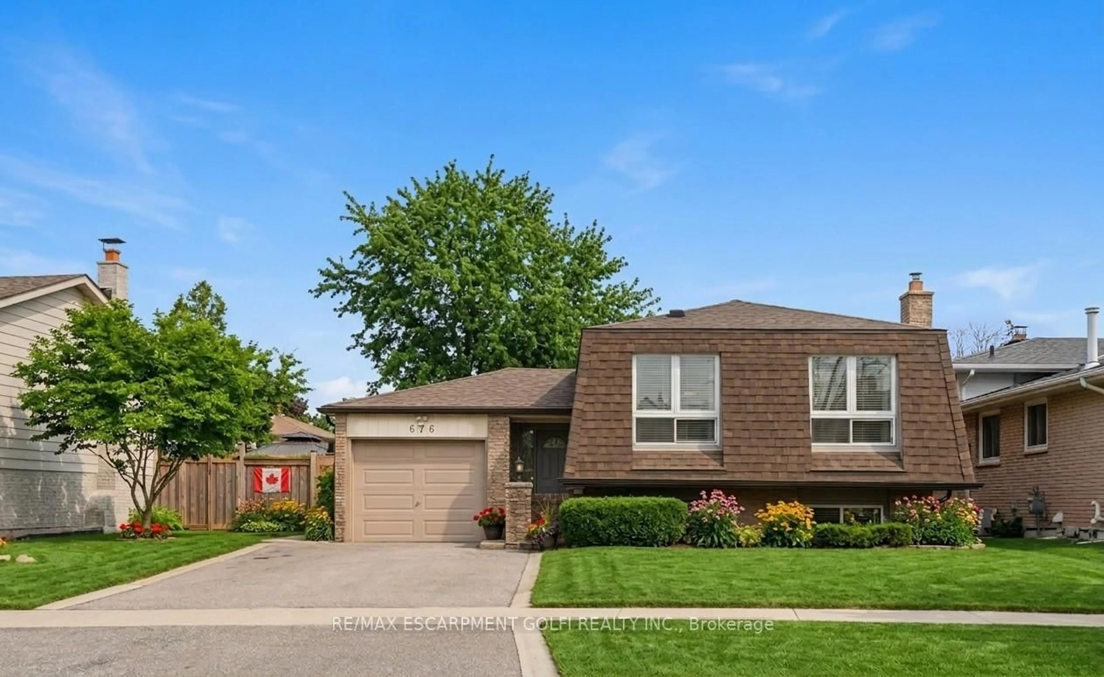 Home with brick exterior material, street for 676 Woodview Rd, Burlington Ontario L7N 3A5