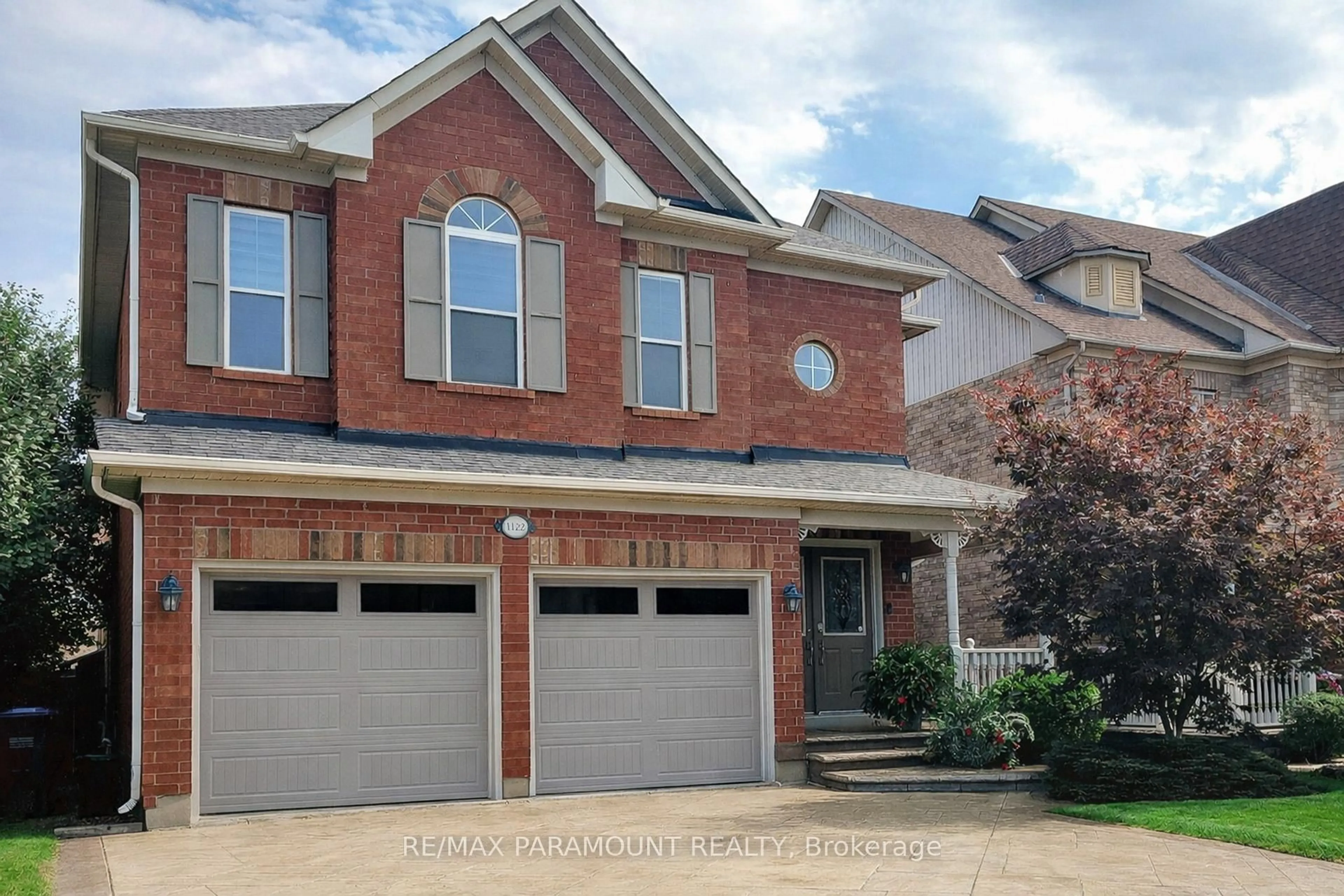 Home with brick exterior material, street for 1122 Lamplight Way, Mississauga Ontario L5W 1J4