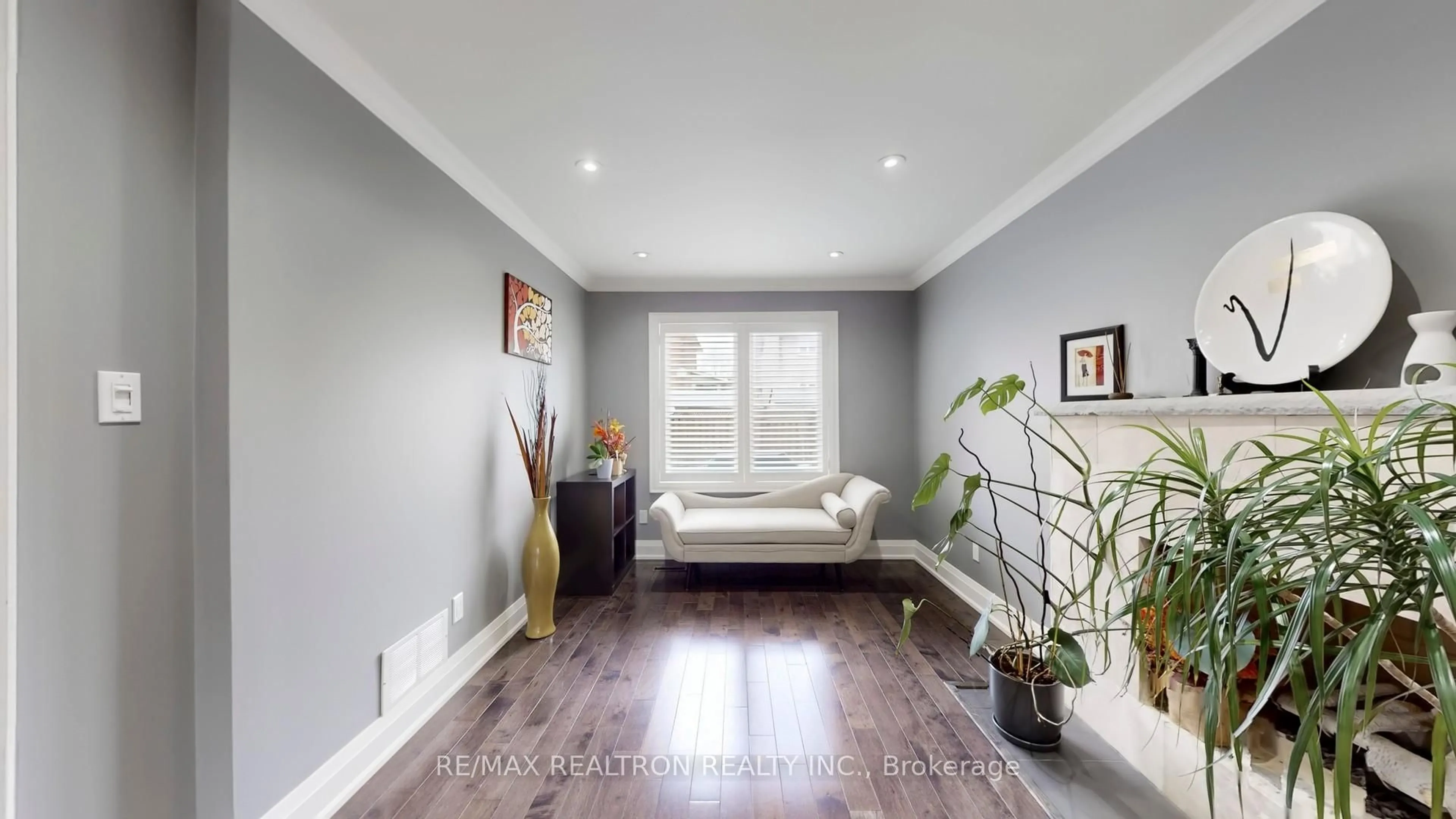 Living room with furniture, wood/laminate floor for 229 Kingsbridge Garden Circ, Mississauga Ontario L5R 1L4