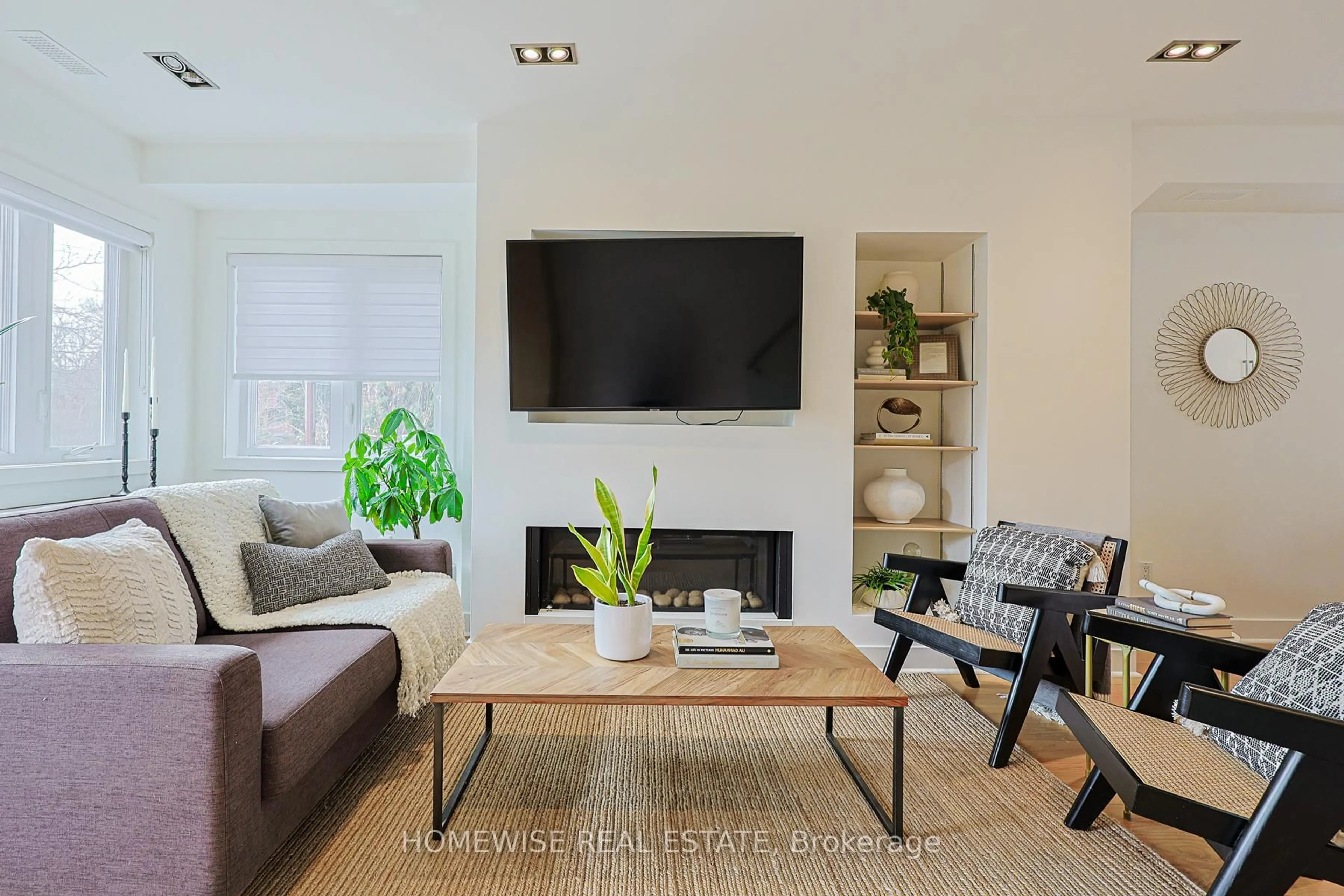 Living room with furniture, wood/laminate floor for 12 Leeds St, Toronto Ontario M6G 1N7