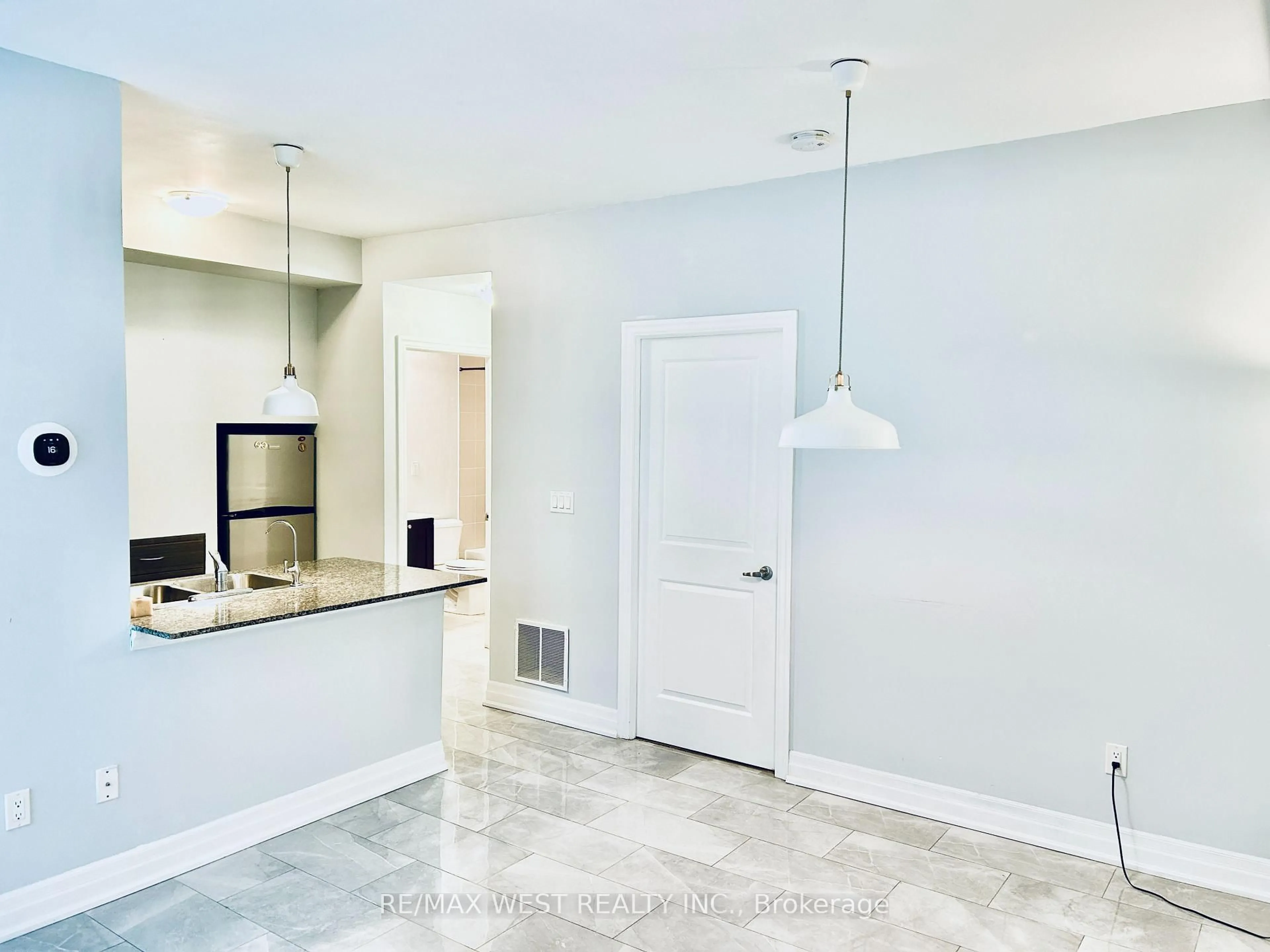 Open concept kitchen, ceramic/tile floor for 5 Sousa Mendes St #102, Toronto Ontario M6P 0A8