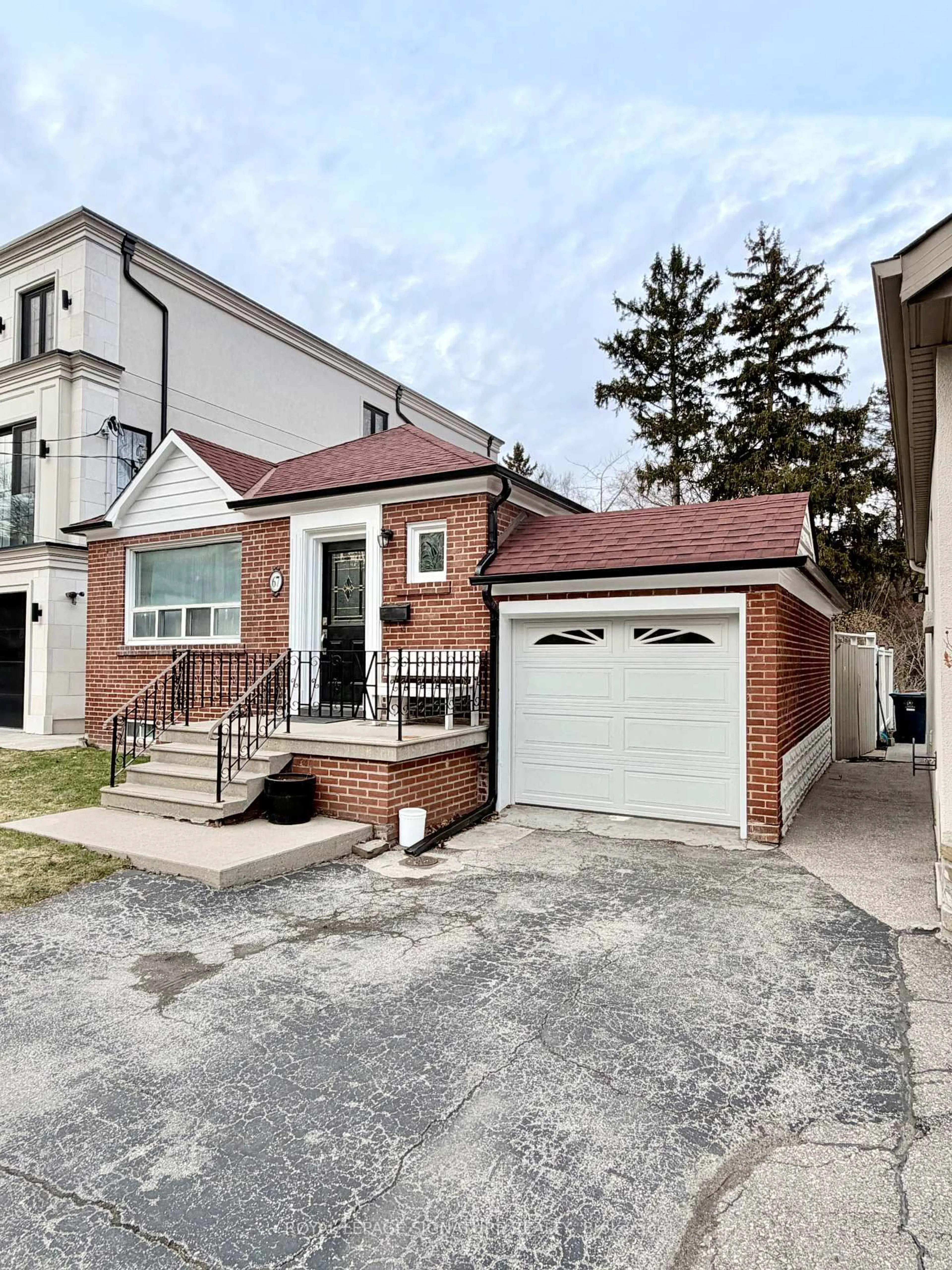 Home with brick exterior material, street for 67 South Kingsway, Toronto Ontario M6S 3T4