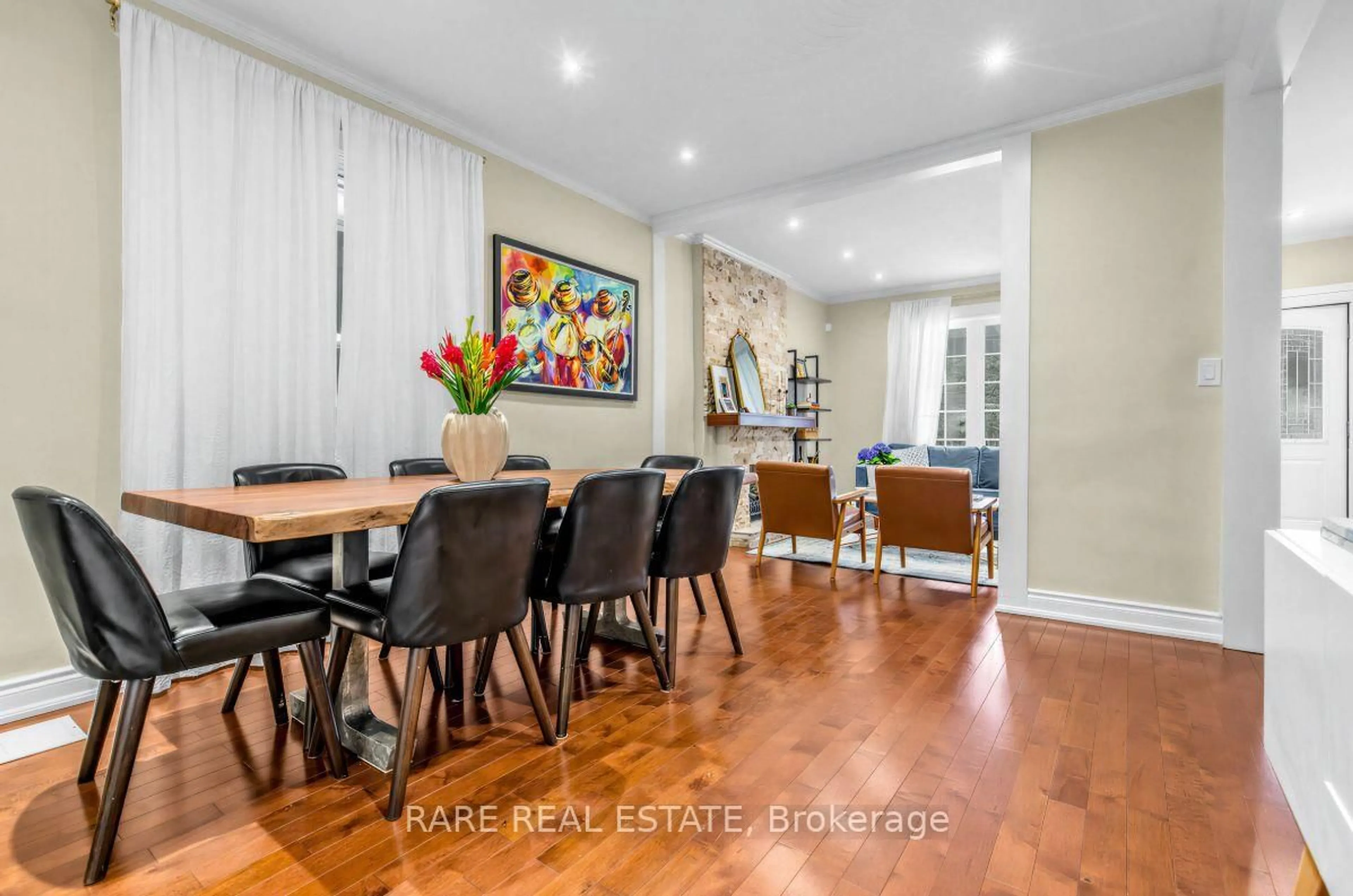 Dining room, wood/laminate floor for 18 Earlscourt Ave, Toronto Ontario M6E 4A6