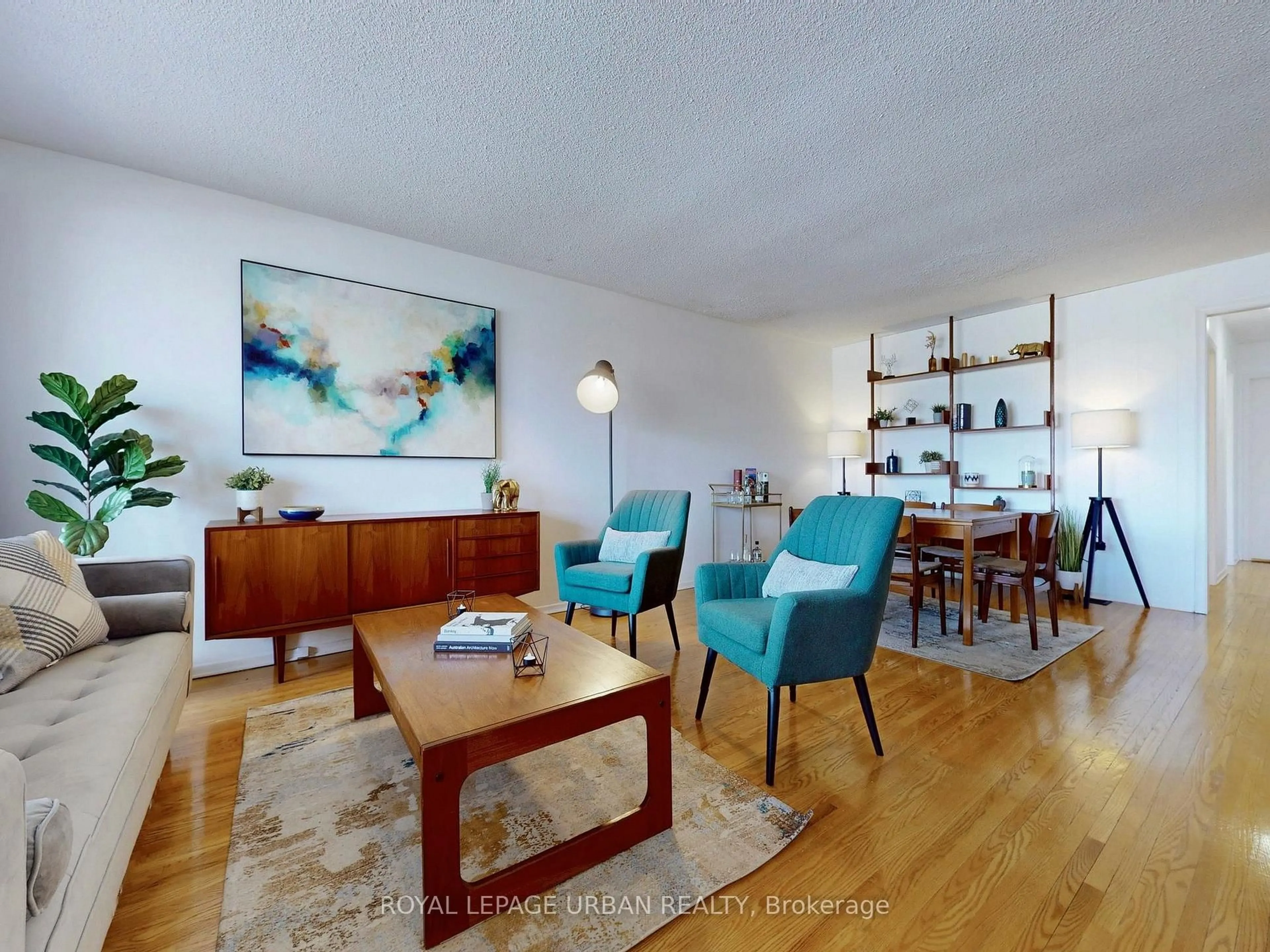 Living room with furniture, wood/laminate floor for 733 Consort Cres, Mississauga Ontario L5C 1J8