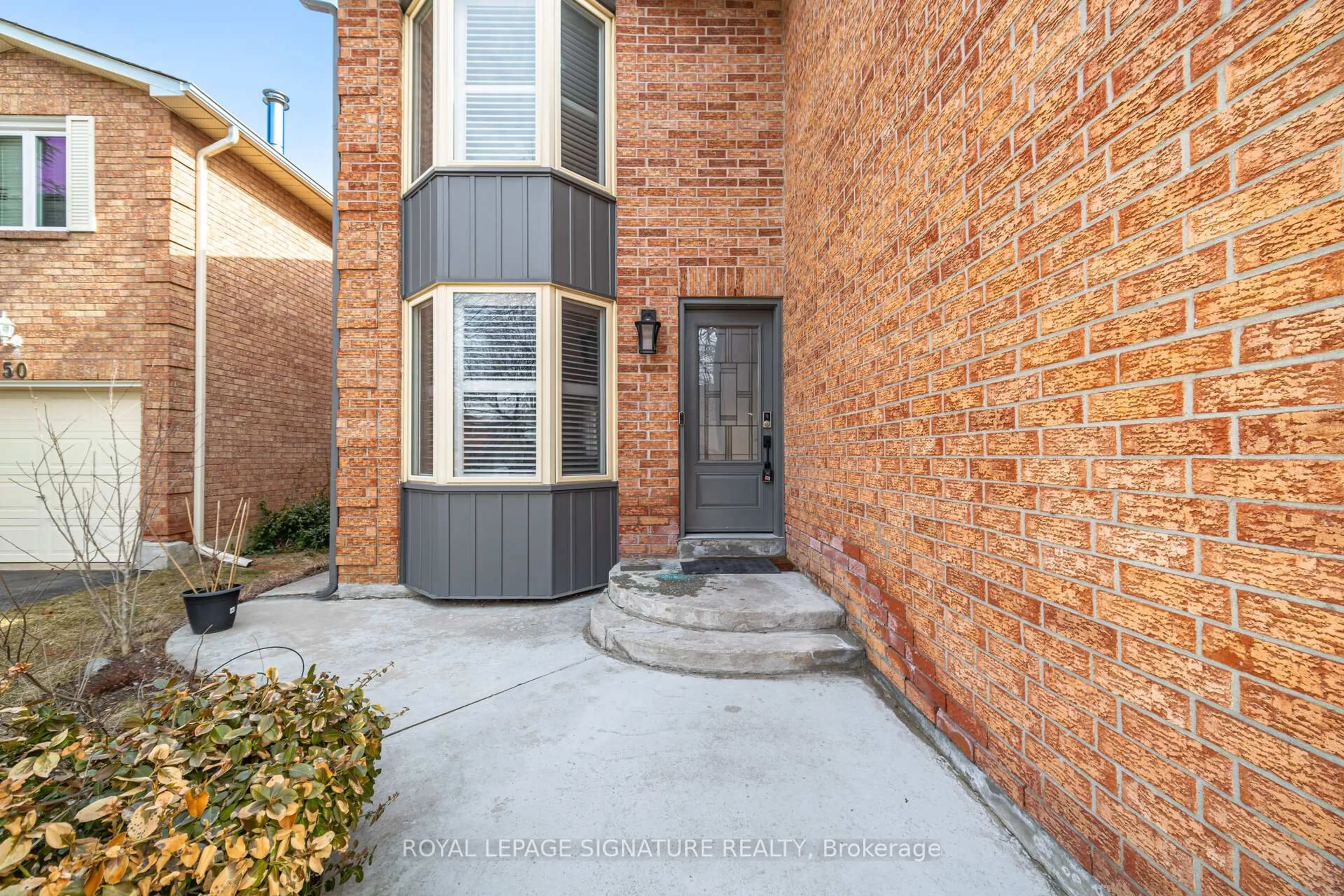 Home with brick exterior material, street for 48 Evalene Crt, Brampton Ontario L6Z 3A5