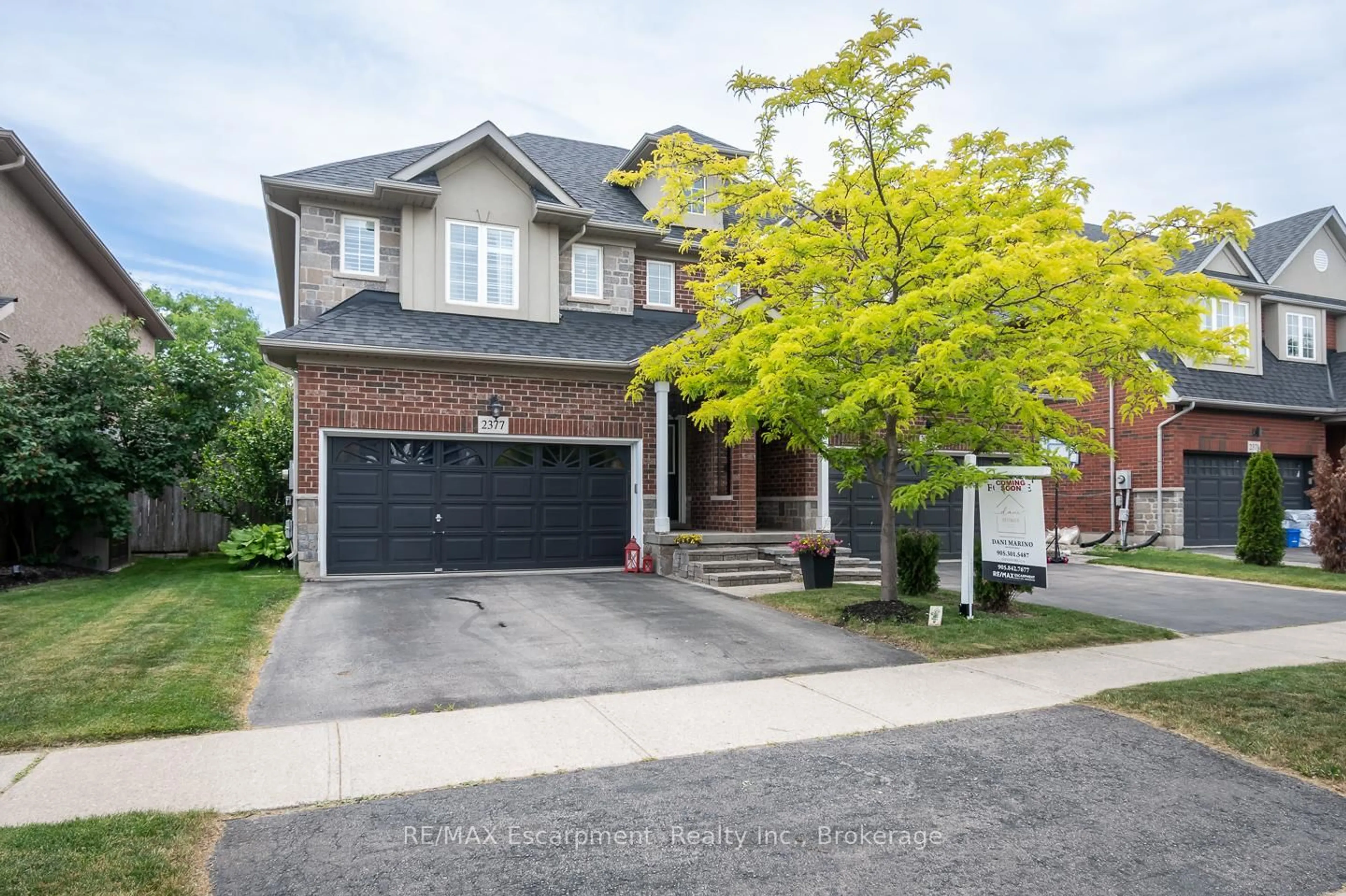 Home with brick exterior material, street for 2377 Stone Glen Cres, Oakville Ontario L6M 0C7