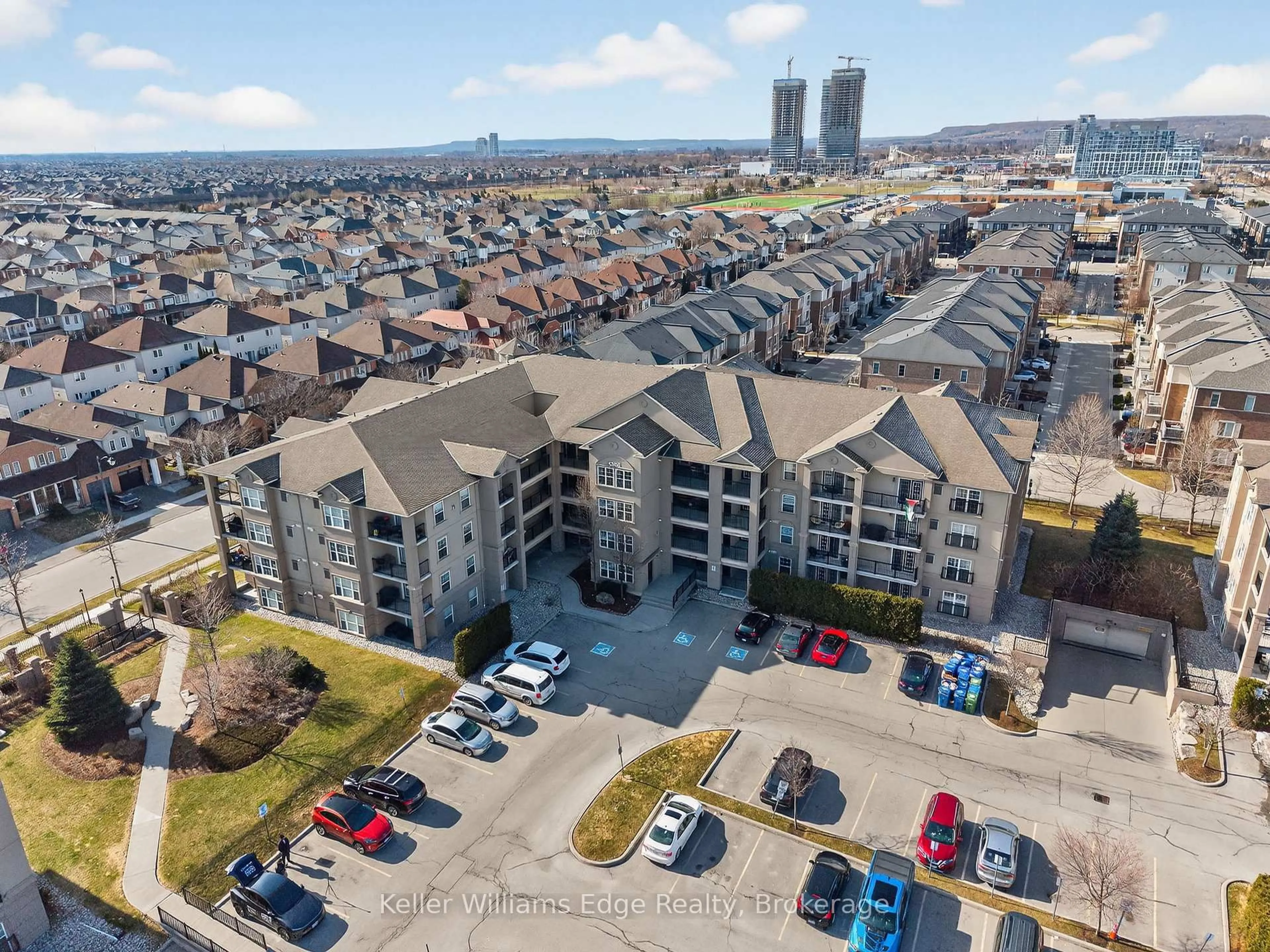 A pic from outside/outdoor area/front of a property/back of a property/a pic from drone, city buildings view from balcony for 1350 Main St #301, Milton Ontario L9T 7S7