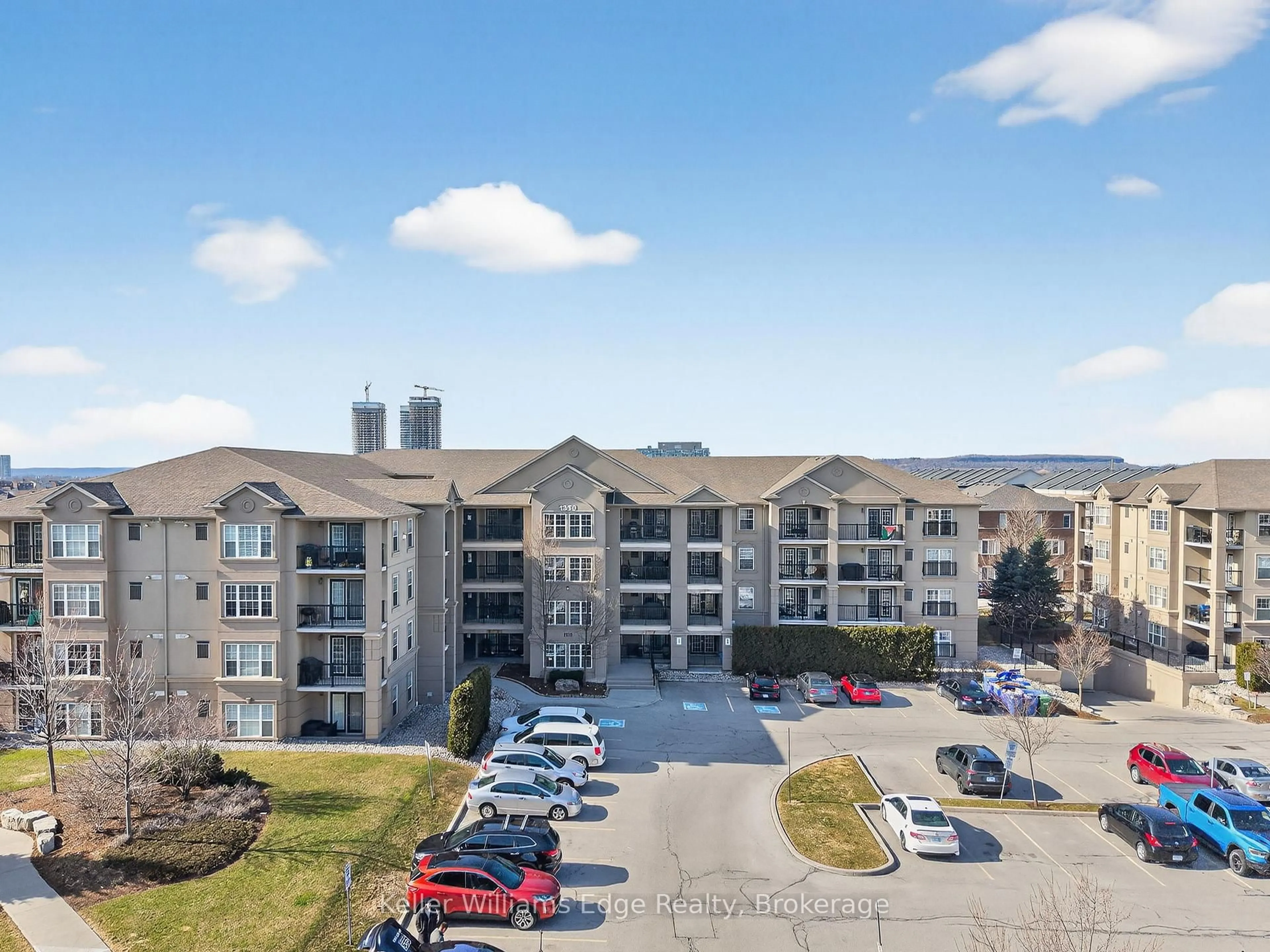 A pic from outside/outdoor area/front of a property/back of a property/a pic from drone, unknown for 1350 Main St #301, Milton Ontario L9T 7S7