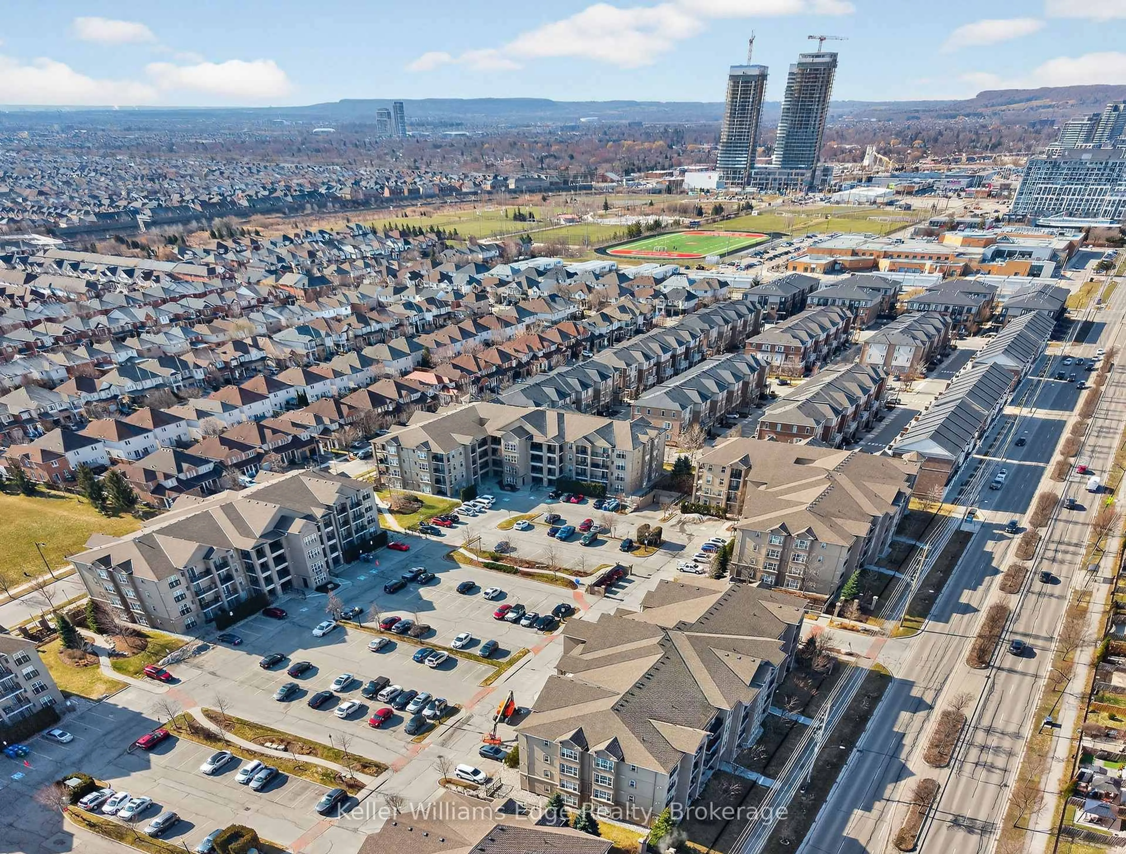 A pic from outside/outdoor area/front of a property/back of a property/a pic from drone, city buildings view from balcony for 1350 Main St #301, Milton Ontario L9T 7S7