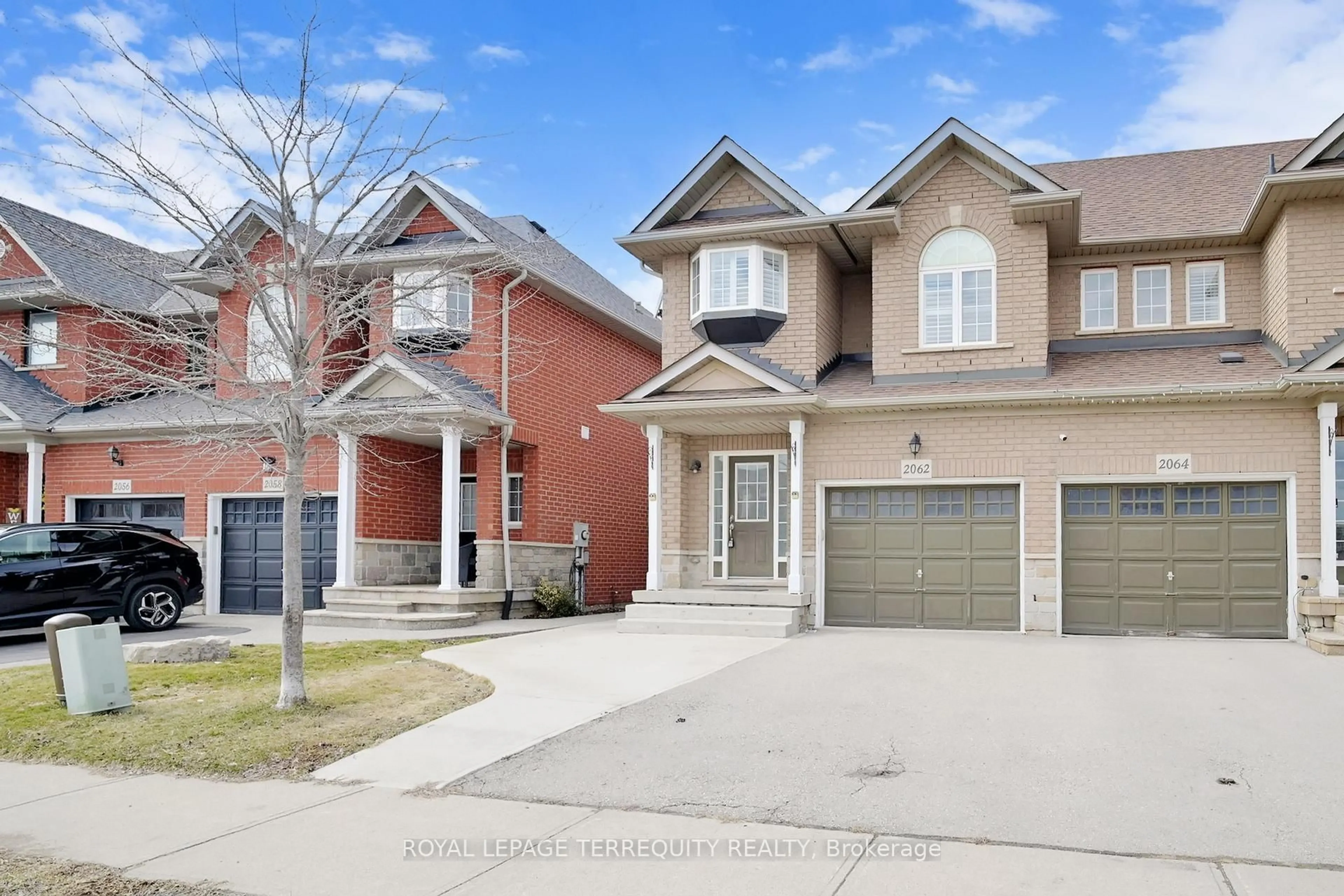 Home with brick exterior material, street for 2062 Redstone Cres, Oakville Ontario L6M 5B1