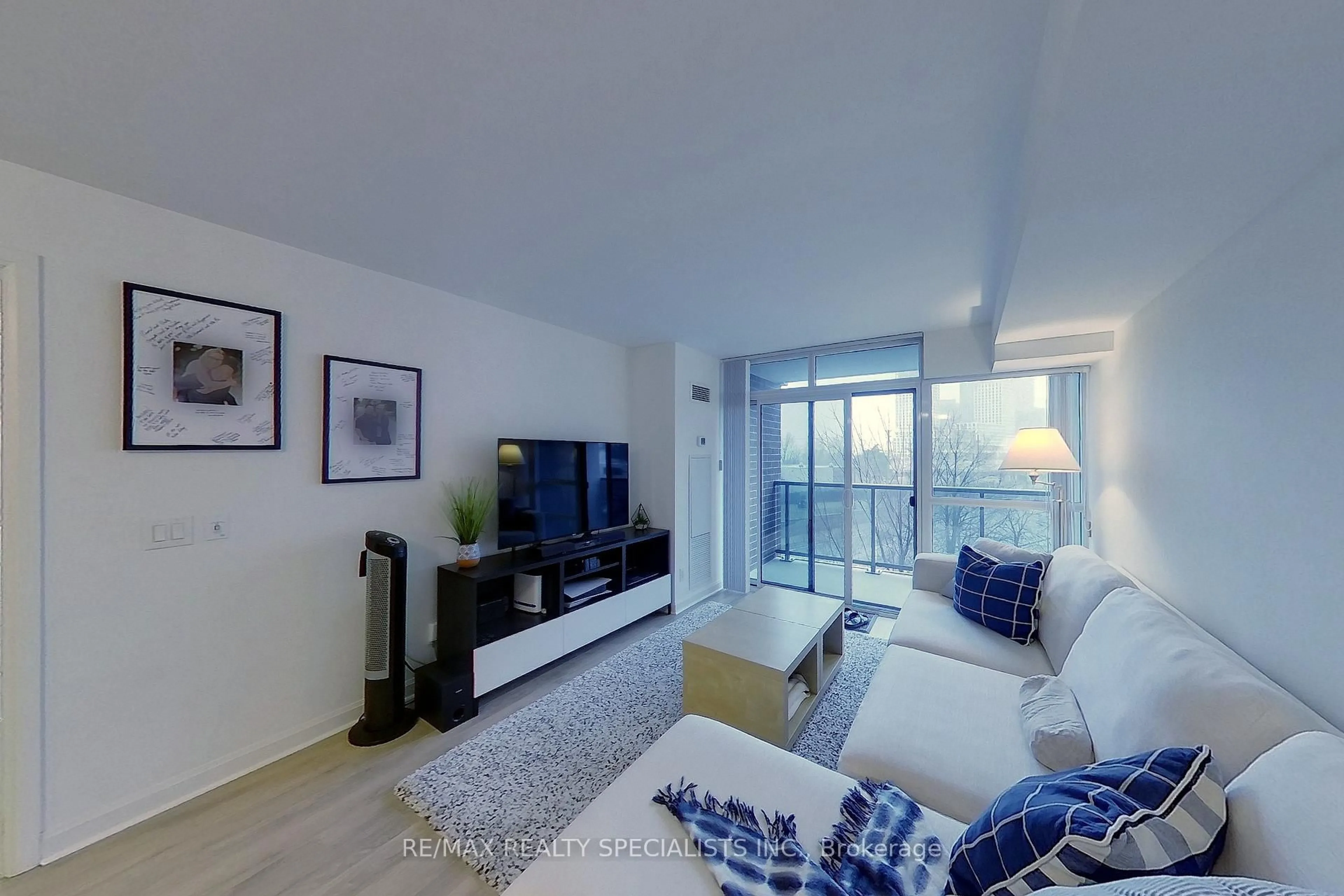 Living room with furniture, unknown for 1 Michael Power Pl #310, Toronto Ontario M9A 0A1