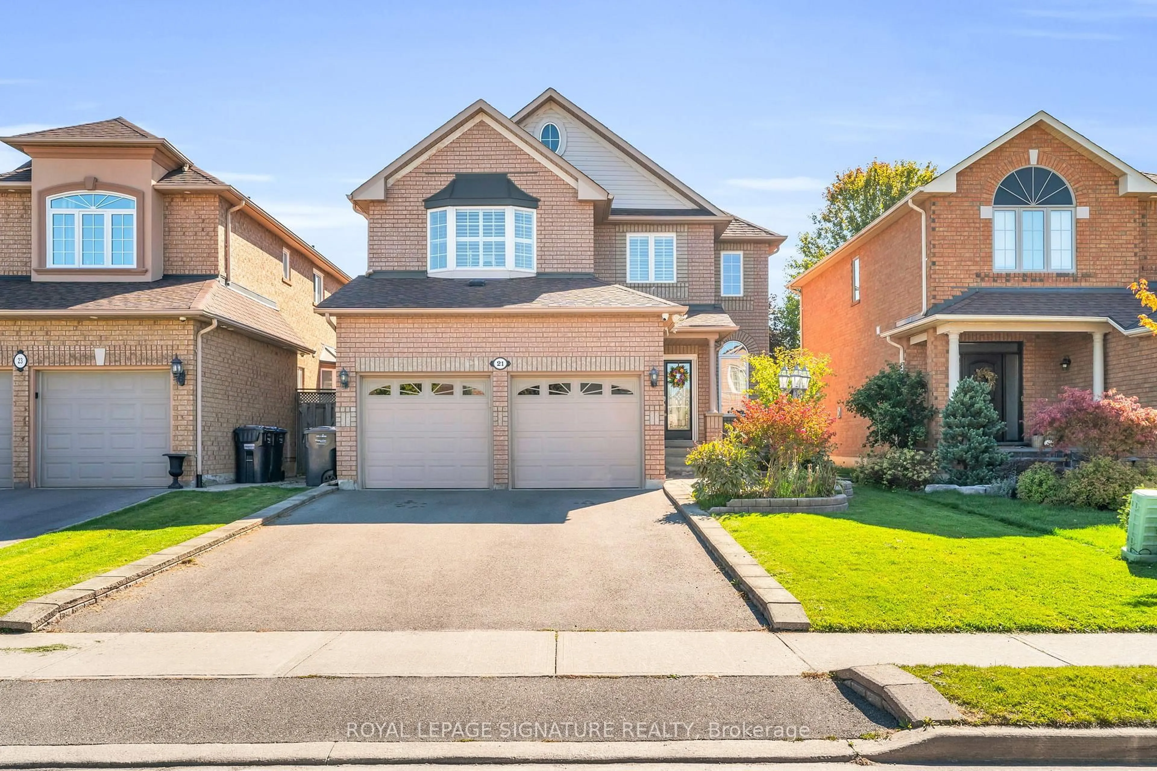 Home with brick exterior material, street for 21 Bushberry Rd, Brampton Ontario L7A 1K4