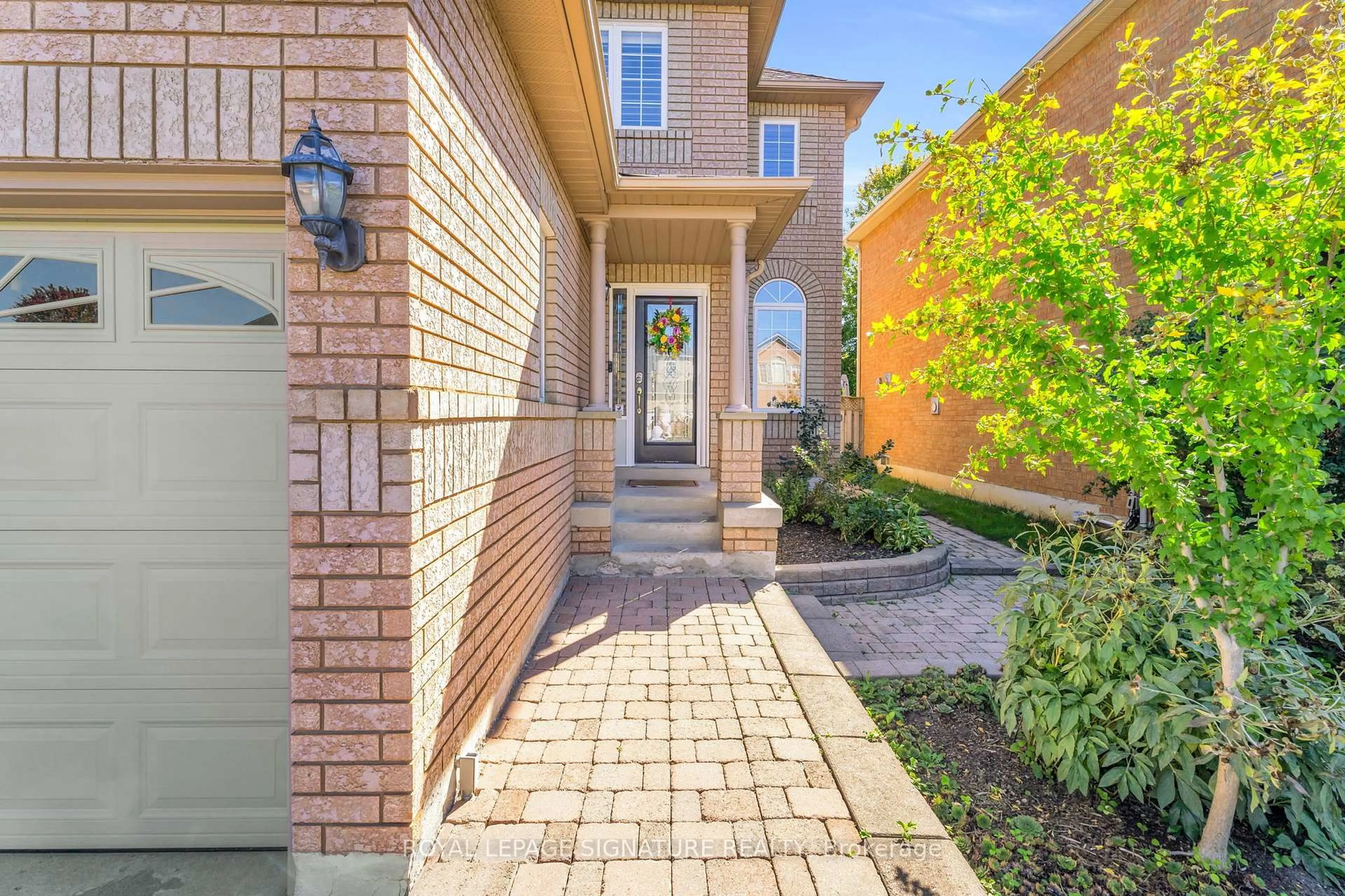 Home with brick exterior material, street for 21 Bushberry Rd, Brampton Ontario L7A 1K4
