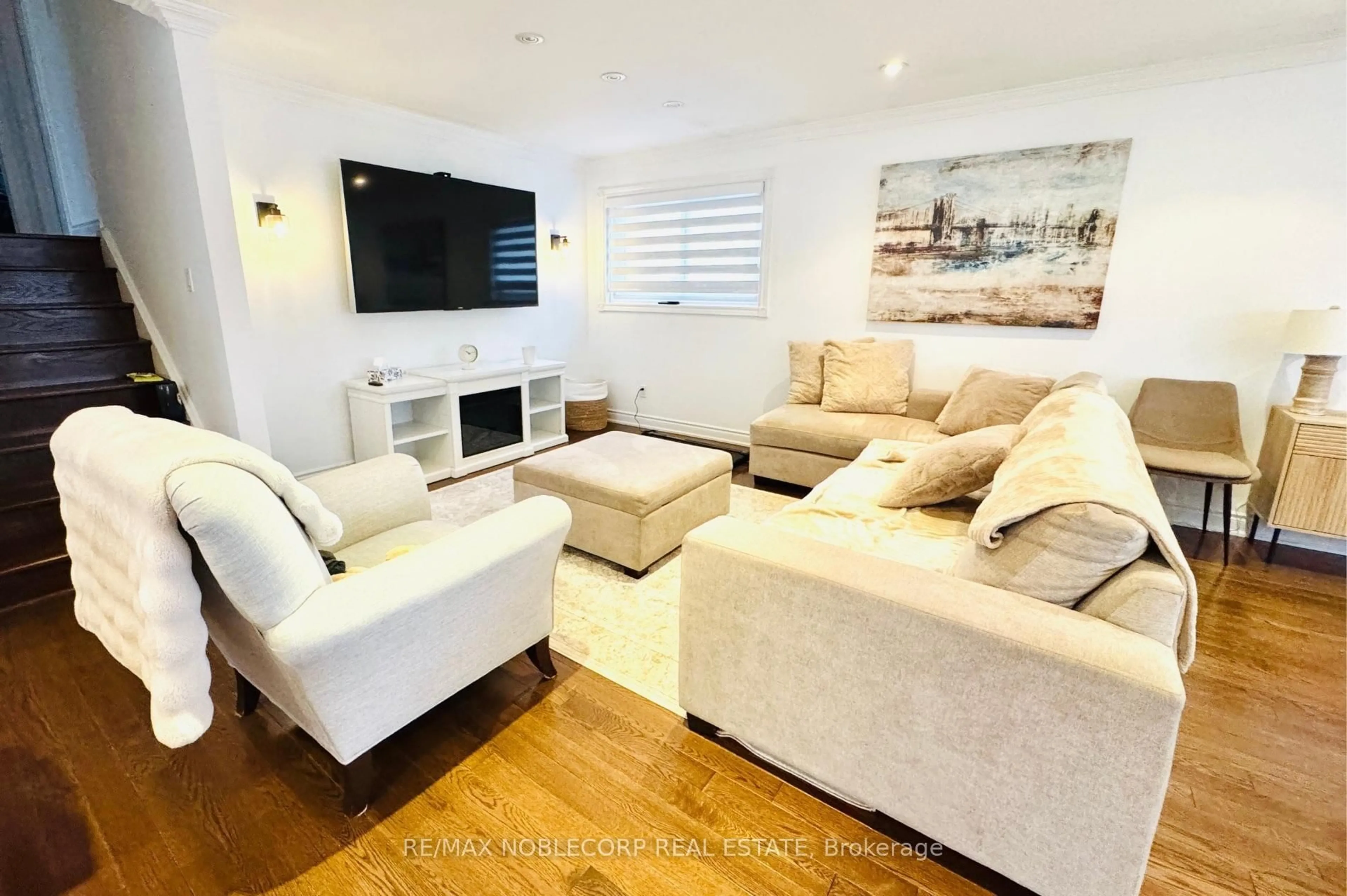 Living room with furniture, wood/laminate floor for 269 Glenwood Cres, Caledon Ontario L7E 1Z5