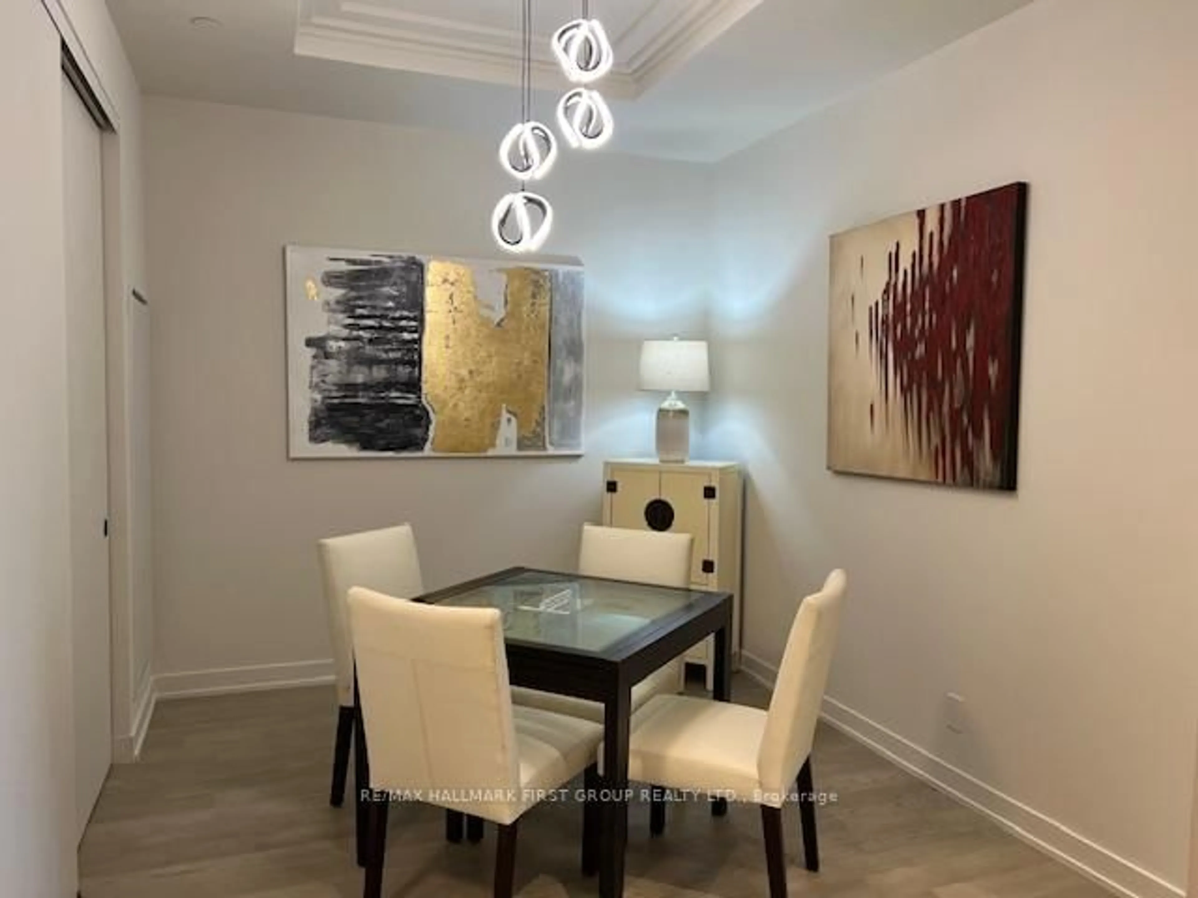 Dining room, wood/laminate floor for 123 Maurice Dr #407, Oakville Ontario L6K 2W6