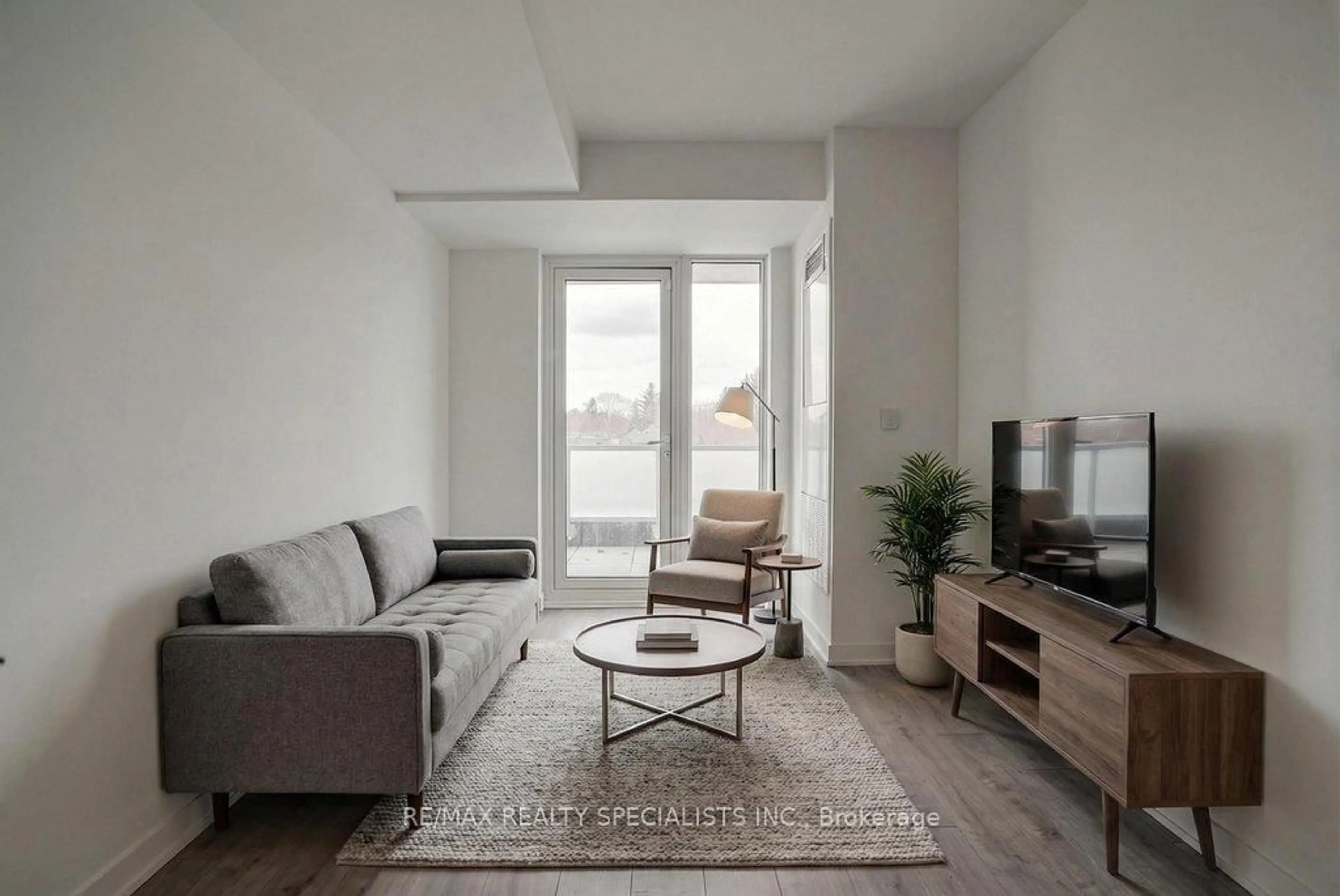 Living room with furniture, unknown for 215 Lakeshore Rd #207, Mississauga Ontario L5H 0A7