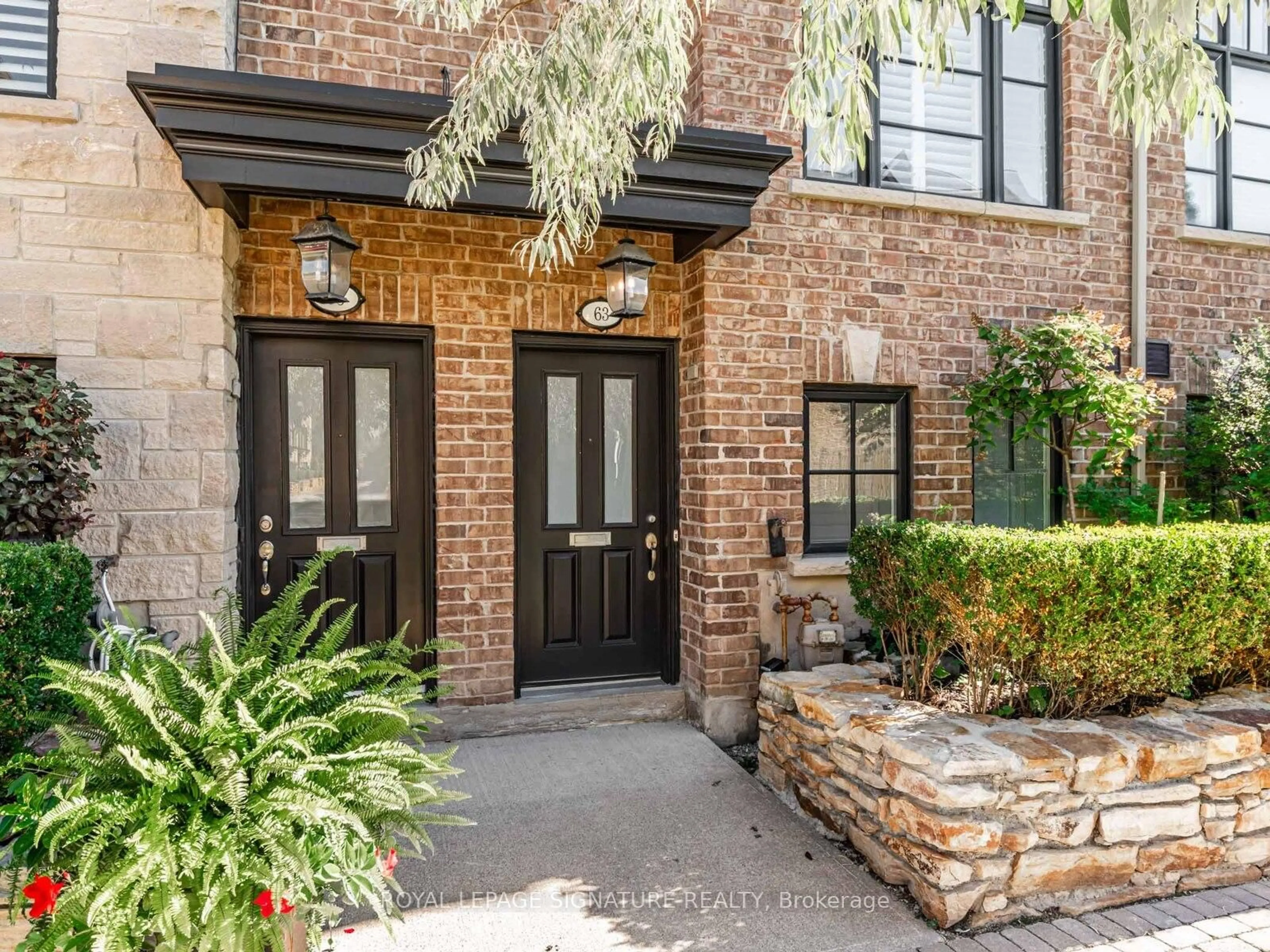 Home with brick exterior material, street for 63 Ruby Lang Lane, Toronto Ontario M8Z 0B8